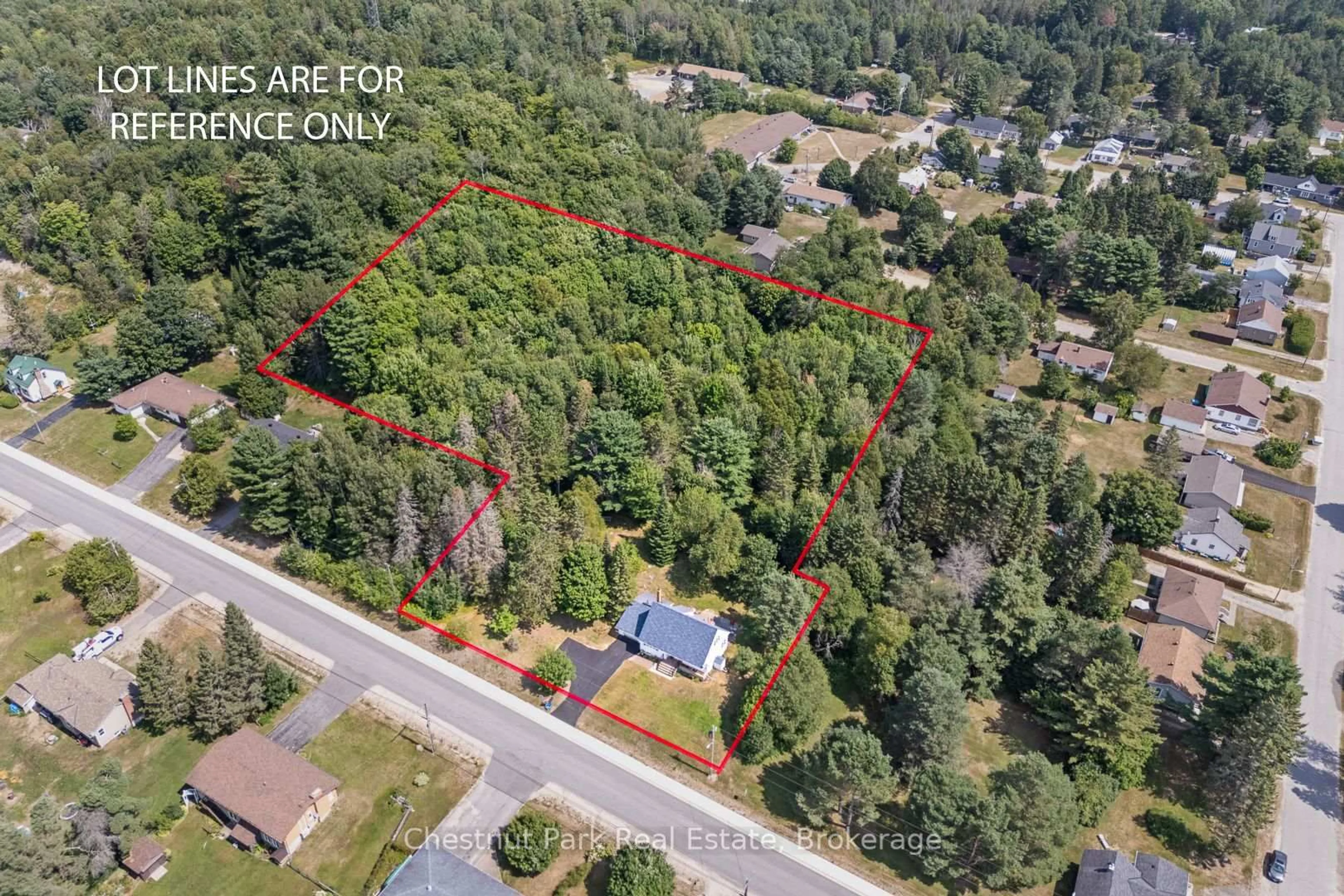 A pic from outside/outdoor area/front of a property/back of a property/a pic from drone, forest/trees view for 25 Eagle Lake Rd, South River Ontario P0A 1X0