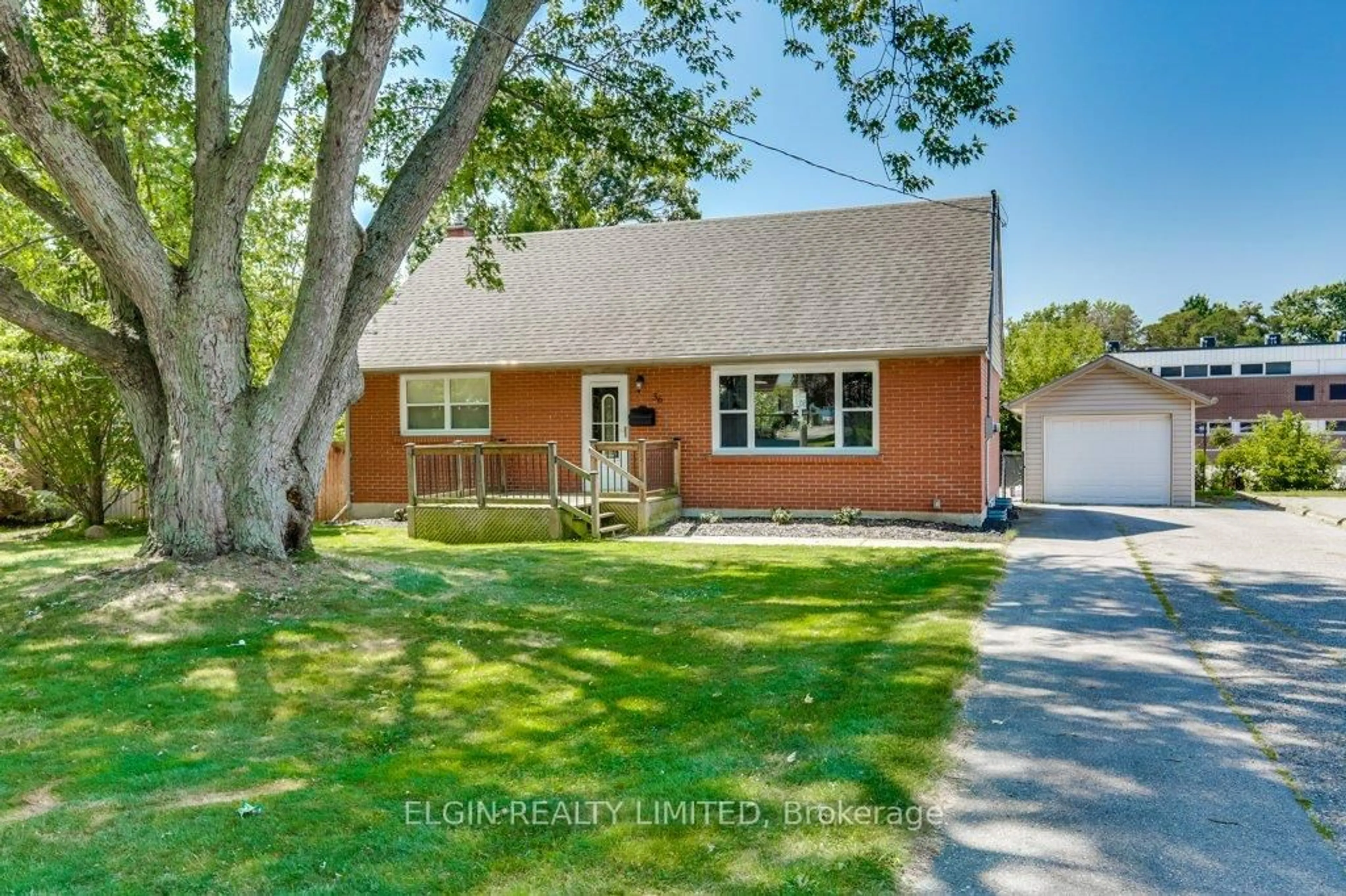 Home with brick exterior material, street for 36 Park Ave, St. Thomas Ontario N5R 4W1
