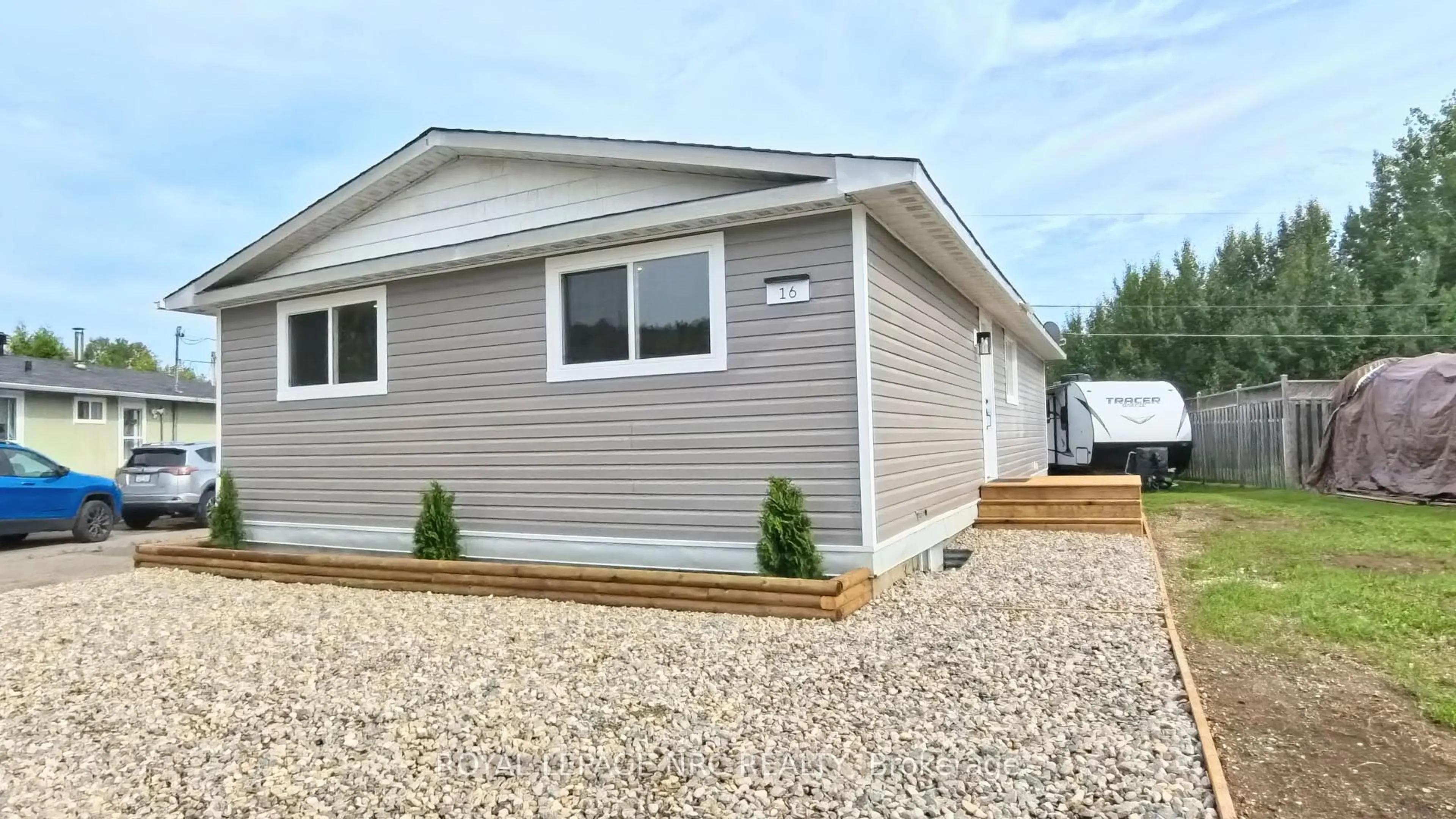 Home with vinyl exterior material, street for 16 Robin Ave, Manitouwadge Ontario P0T 2C0