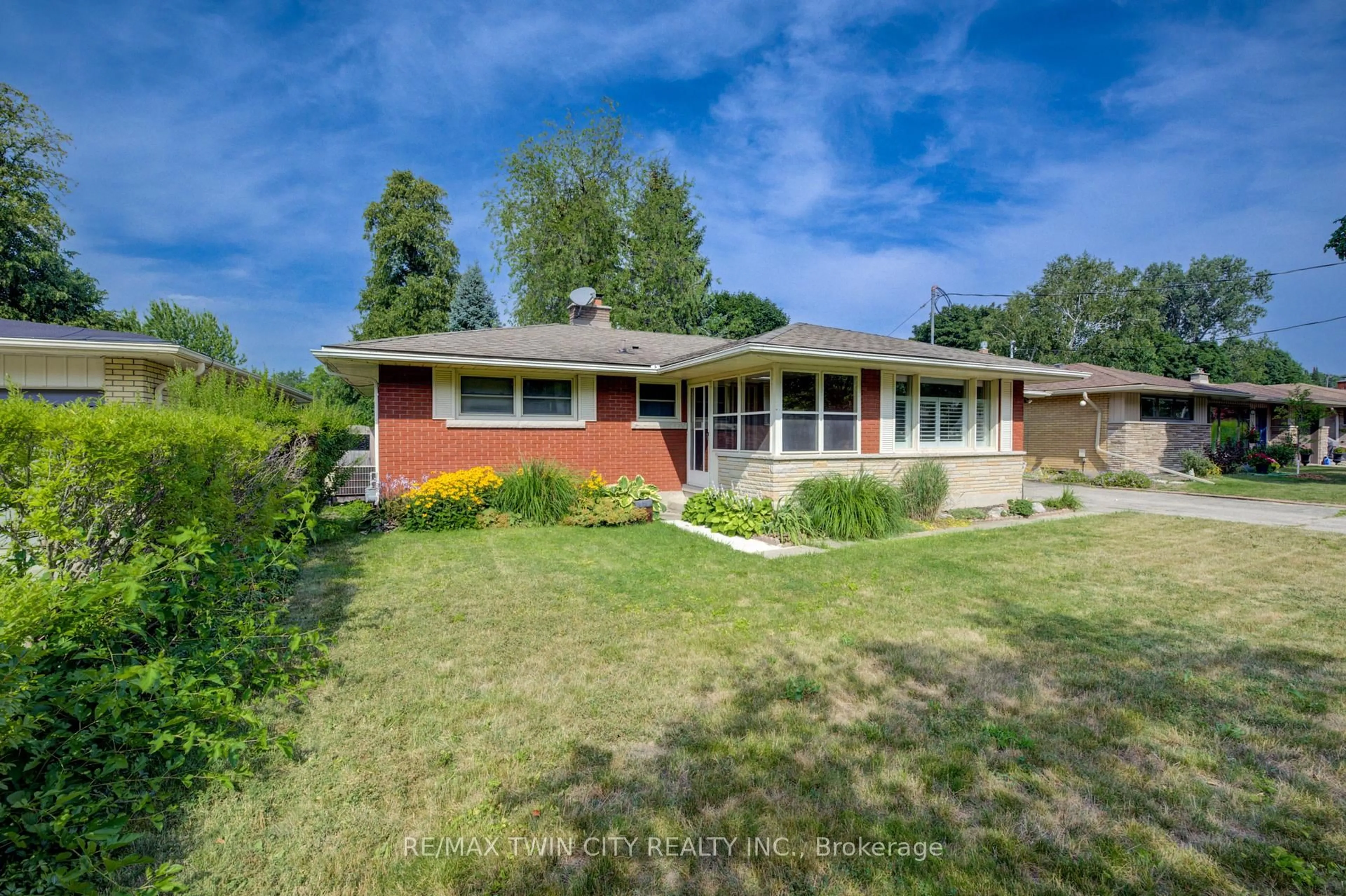 Home with brick exterior material, street for 74 Lakeside Dr, Kitchener Ontario N2M 4C1