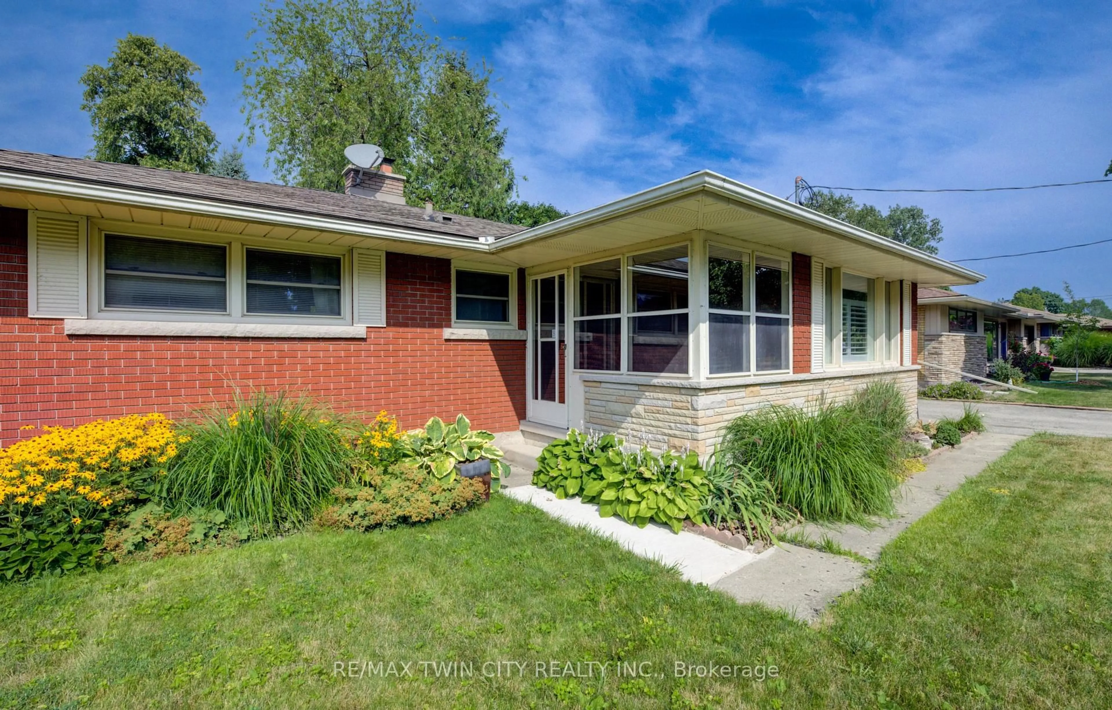 Home with brick exterior material, street for 74 Lakeside Dr, Kitchener Ontario N2M 4C1