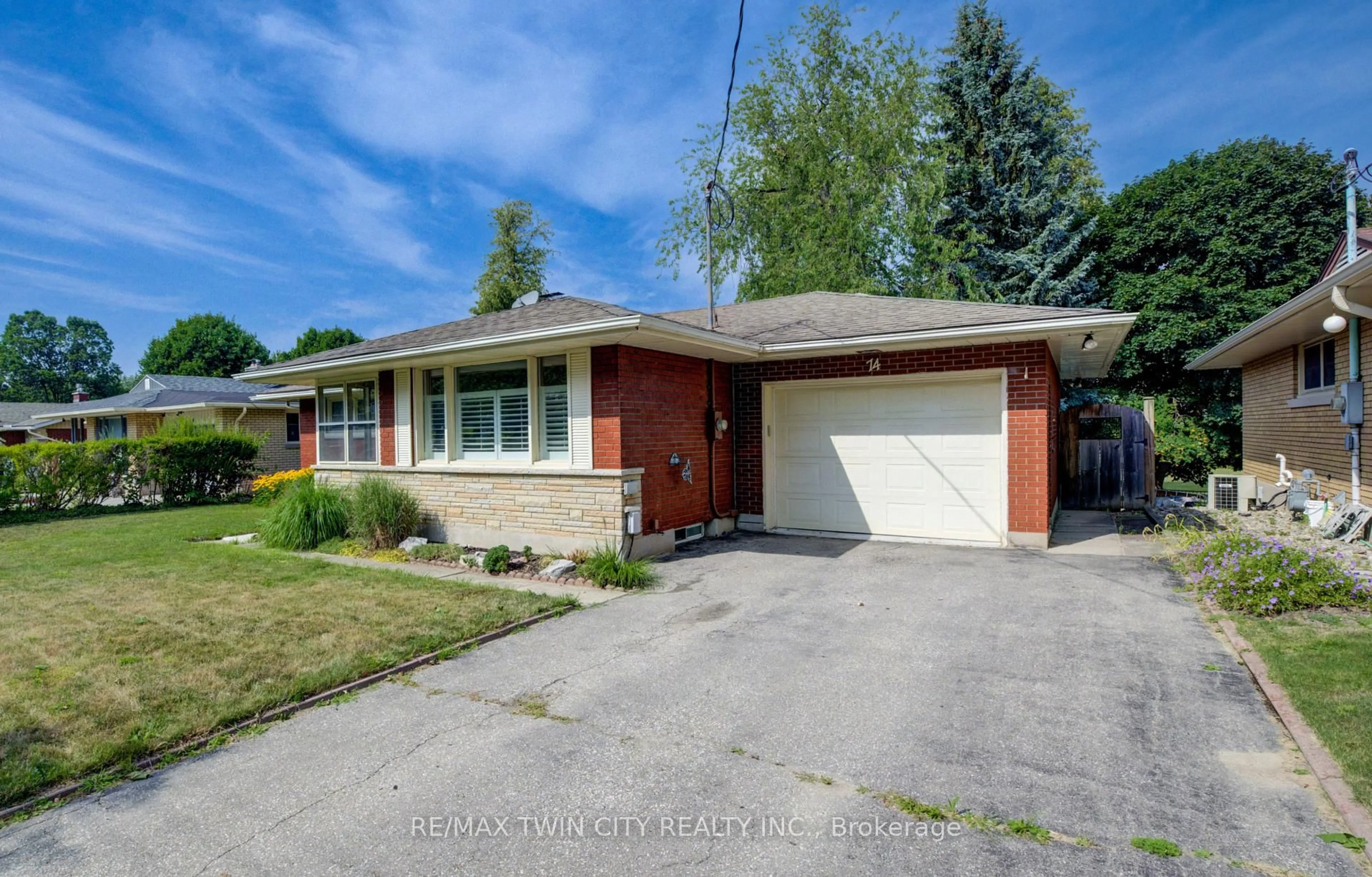 Home with brick exterior material, street for 74 Lakeside Dr, Kitchener Ontario N2M 4C1