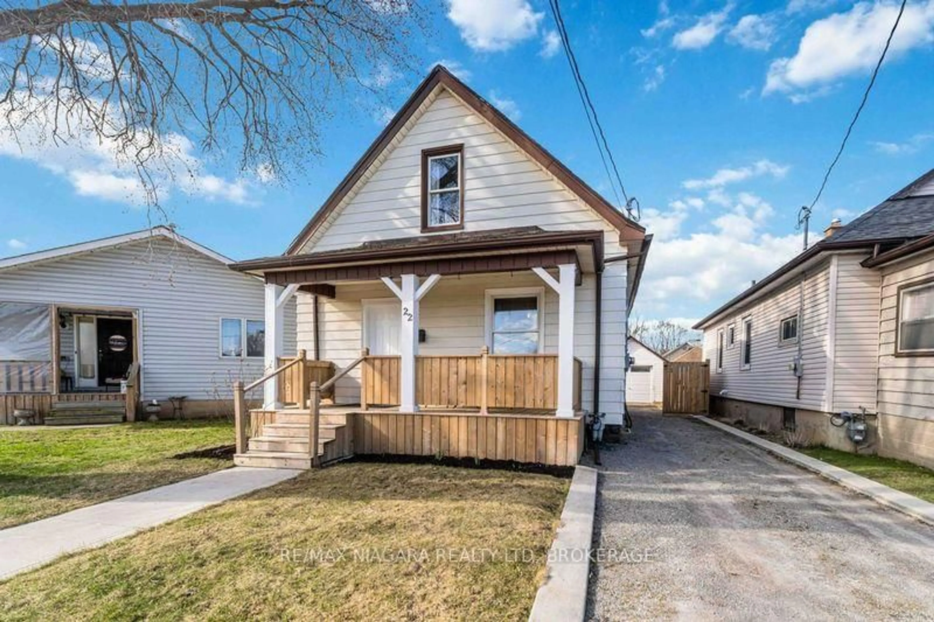 Home with vinyl exterior material, street for 22 Bertram St, St. Catharines Ontario L2R 1A8