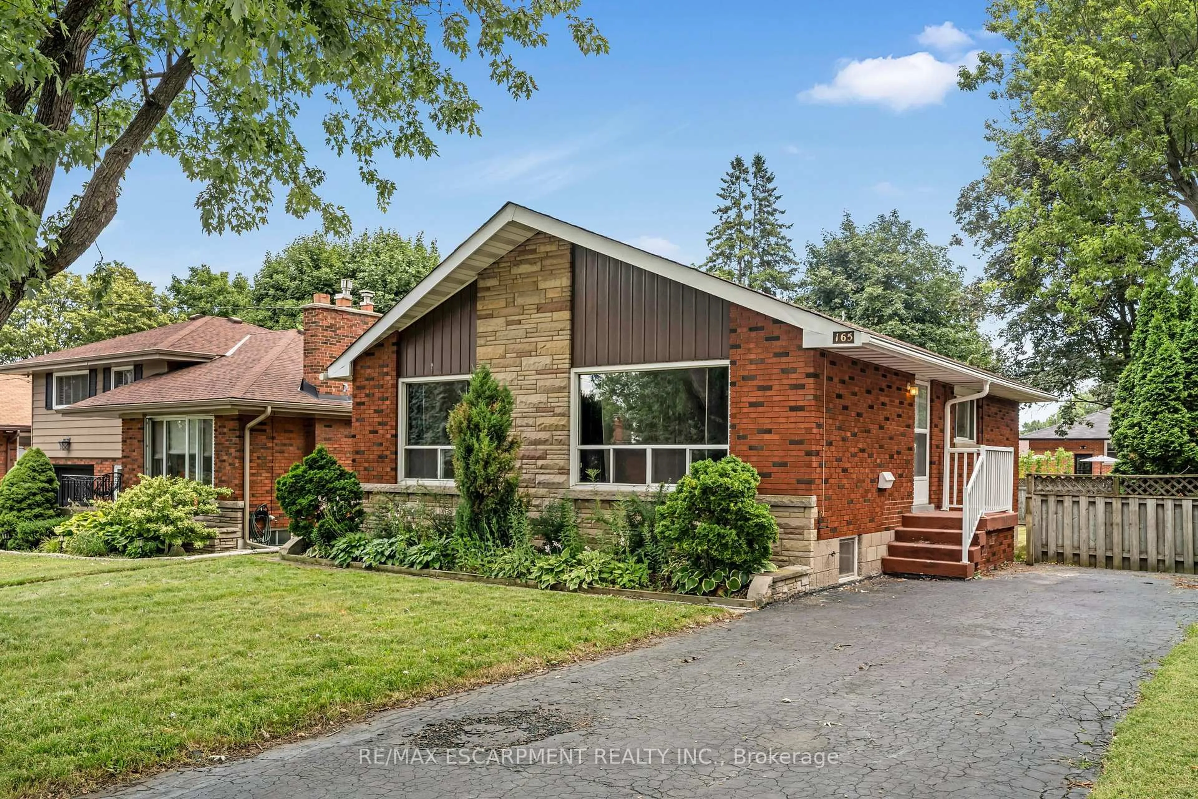 Home with brick exterior material, street for 165 WEST 27TH St, Hamilton Ontario L9C 5A5