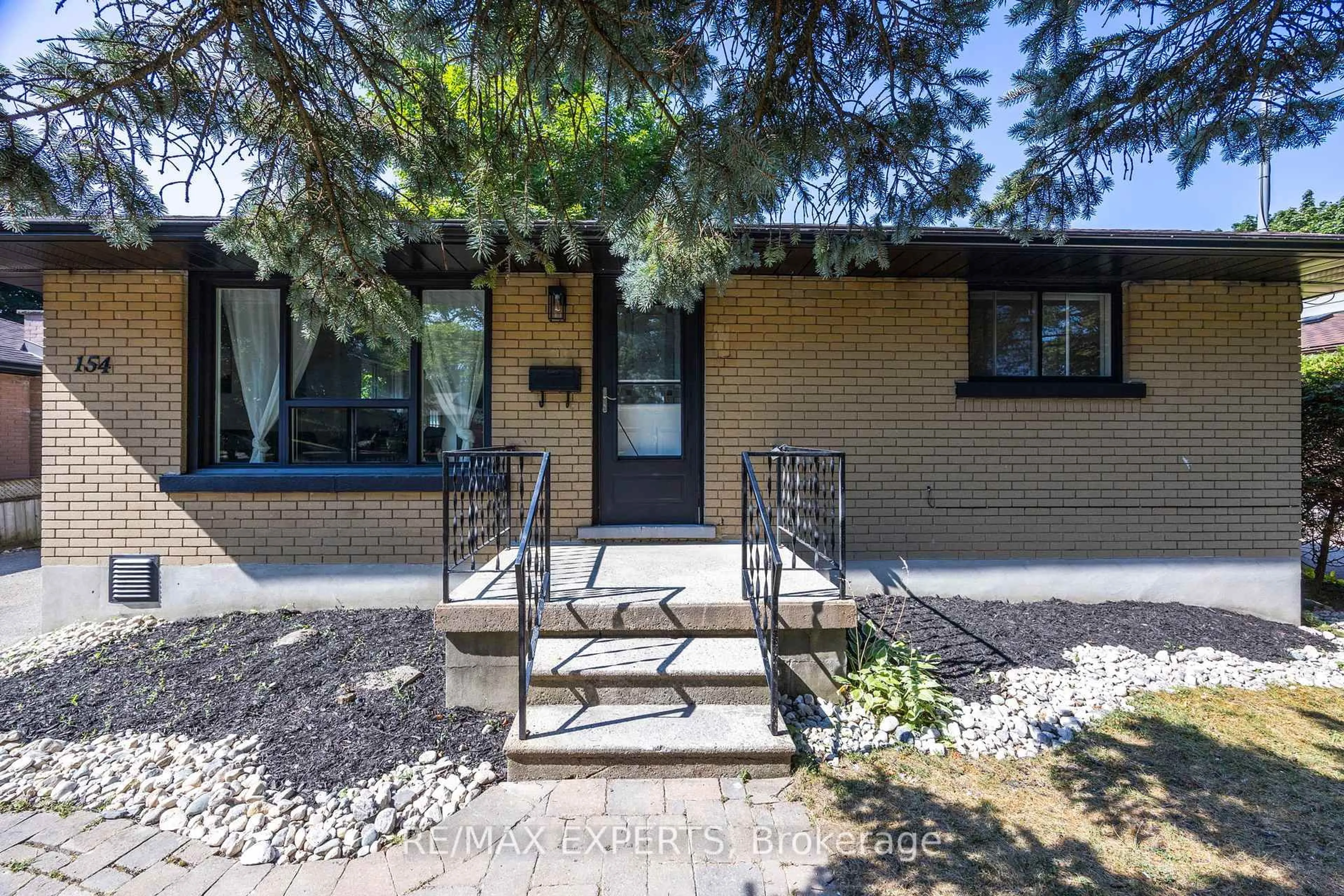 Home with brick exterior material, street for 154 Renfield St, Guelph Ontario N1E 4B2