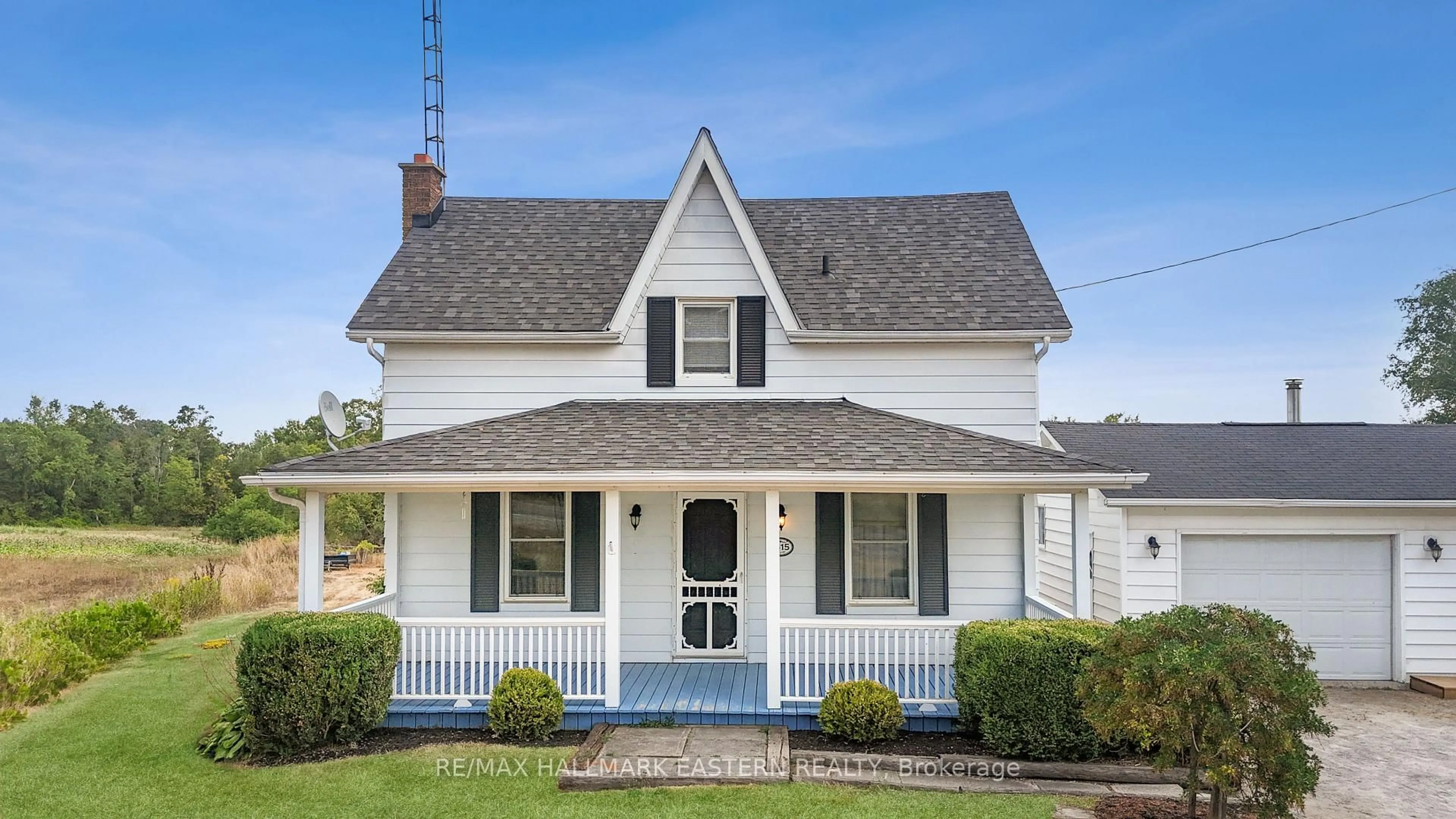 Home with vinyl exterior material, street for 1415 Young's Point Rd, Selwyn Ontario K0L 2H0