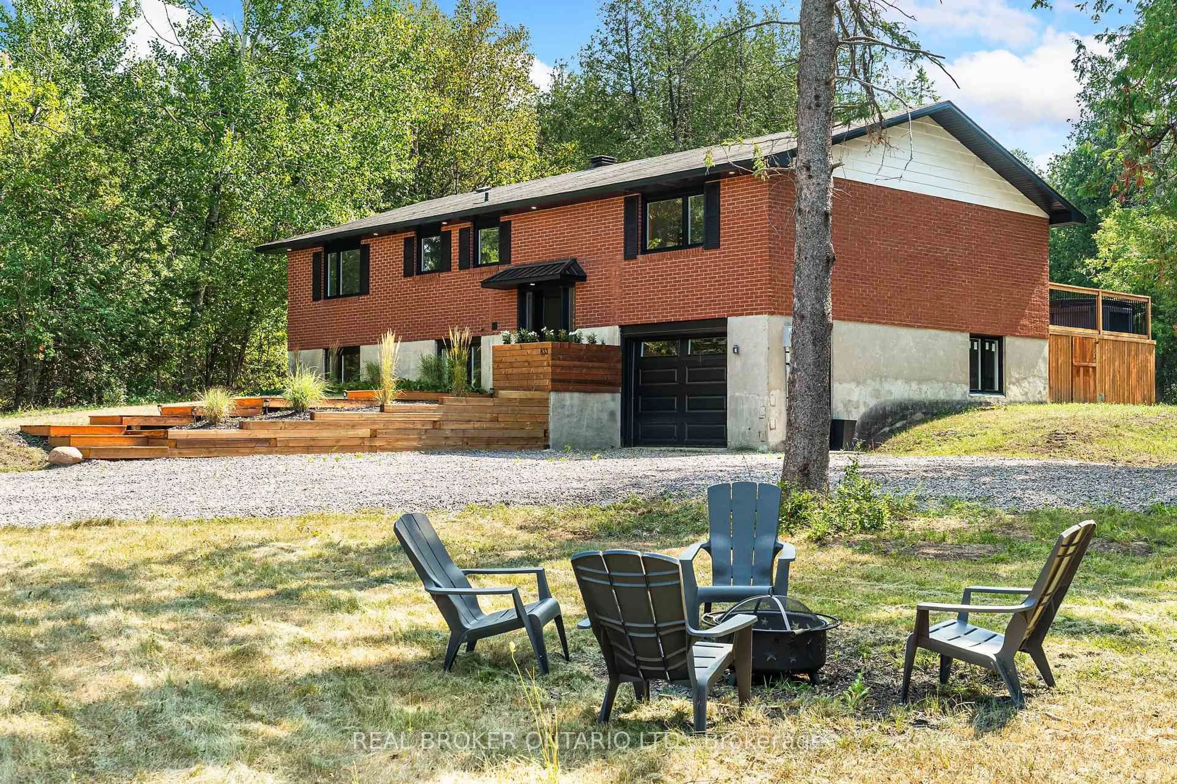 Home with brick exterior material, mountain view for 833 Beavertail Rd, Carp Ontario K0A 1L0