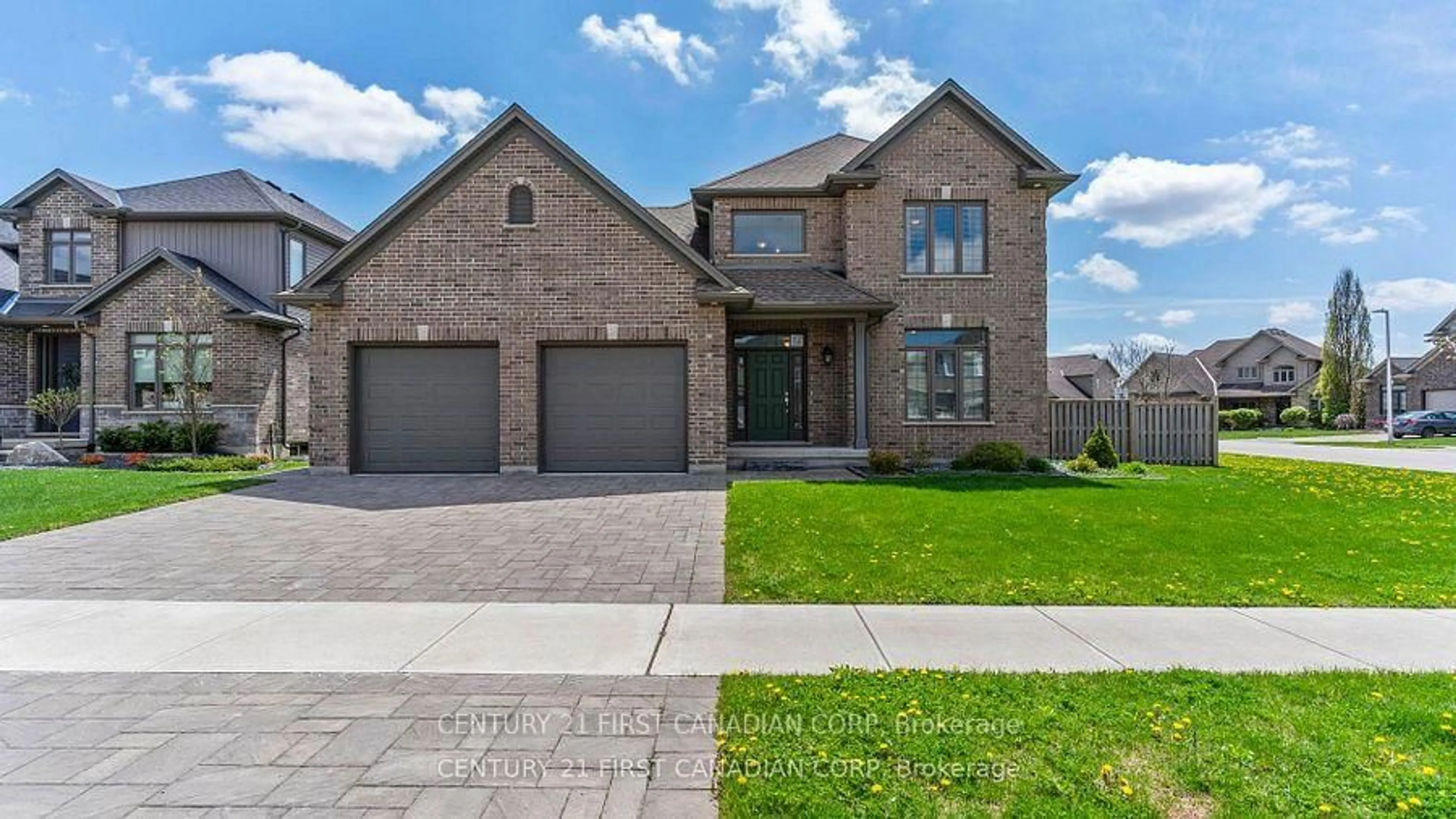 Home with brick exterior material, street for 102 Caverhill Cres, Middlesex Centre Ontario N0L 1R0
