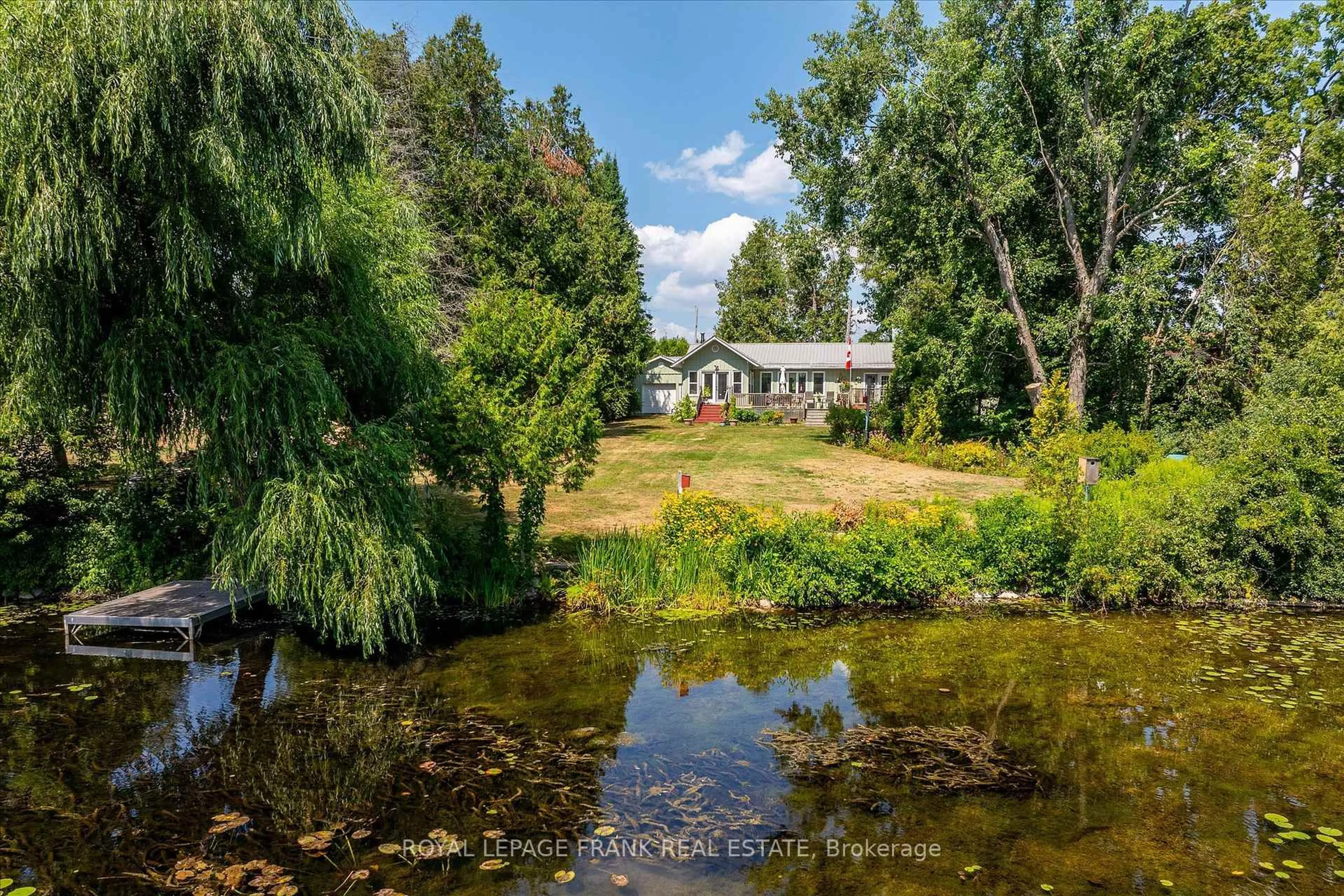 A pic from outside/outdoor area/front of a property/back of a property/a pic from drone, water/lake/river/ocean view for 187 River Lane, Douro-Dummer Ontario K0L 3A0