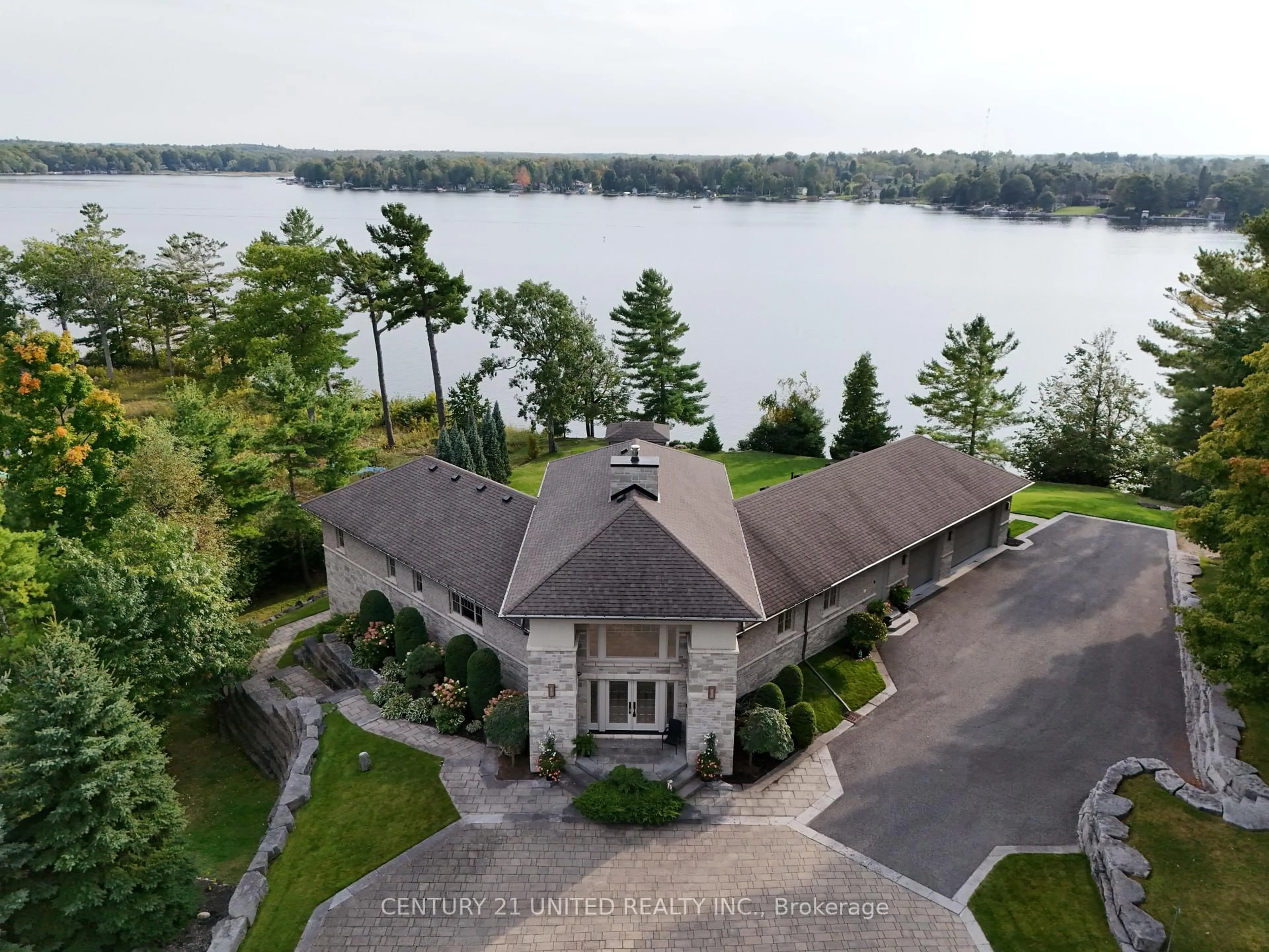 A pic from outside/outdoor area/front of a property/back of a property/a pic from drone, water/lake/river/ocean view for 44 Fire Route 70 Rte, Galway-Cavendish and Harvey Ontario K0L 1J0