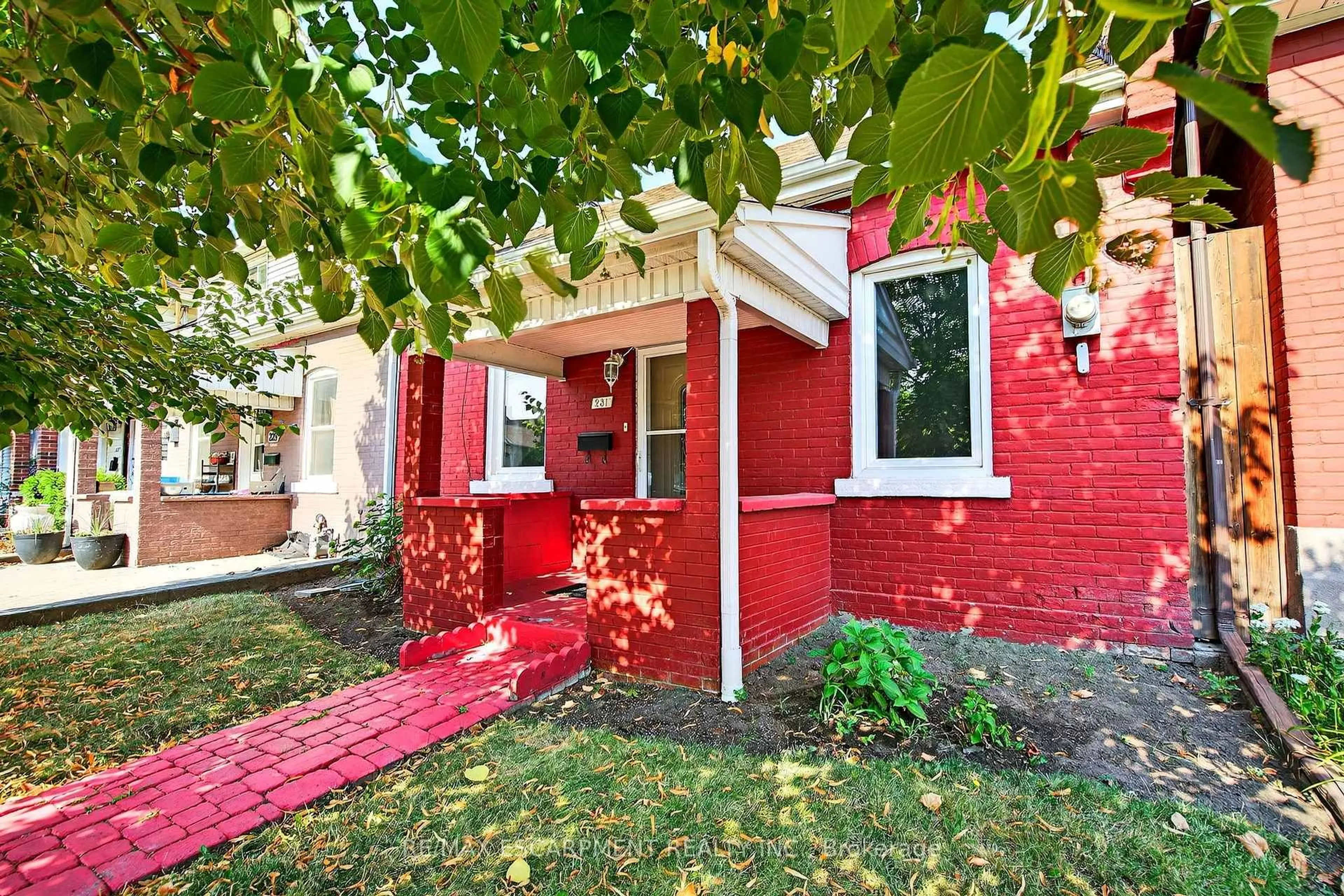 Home with brick exterior material, street for 231 EMERALD St, Hamilton Ontario L8L 5L1