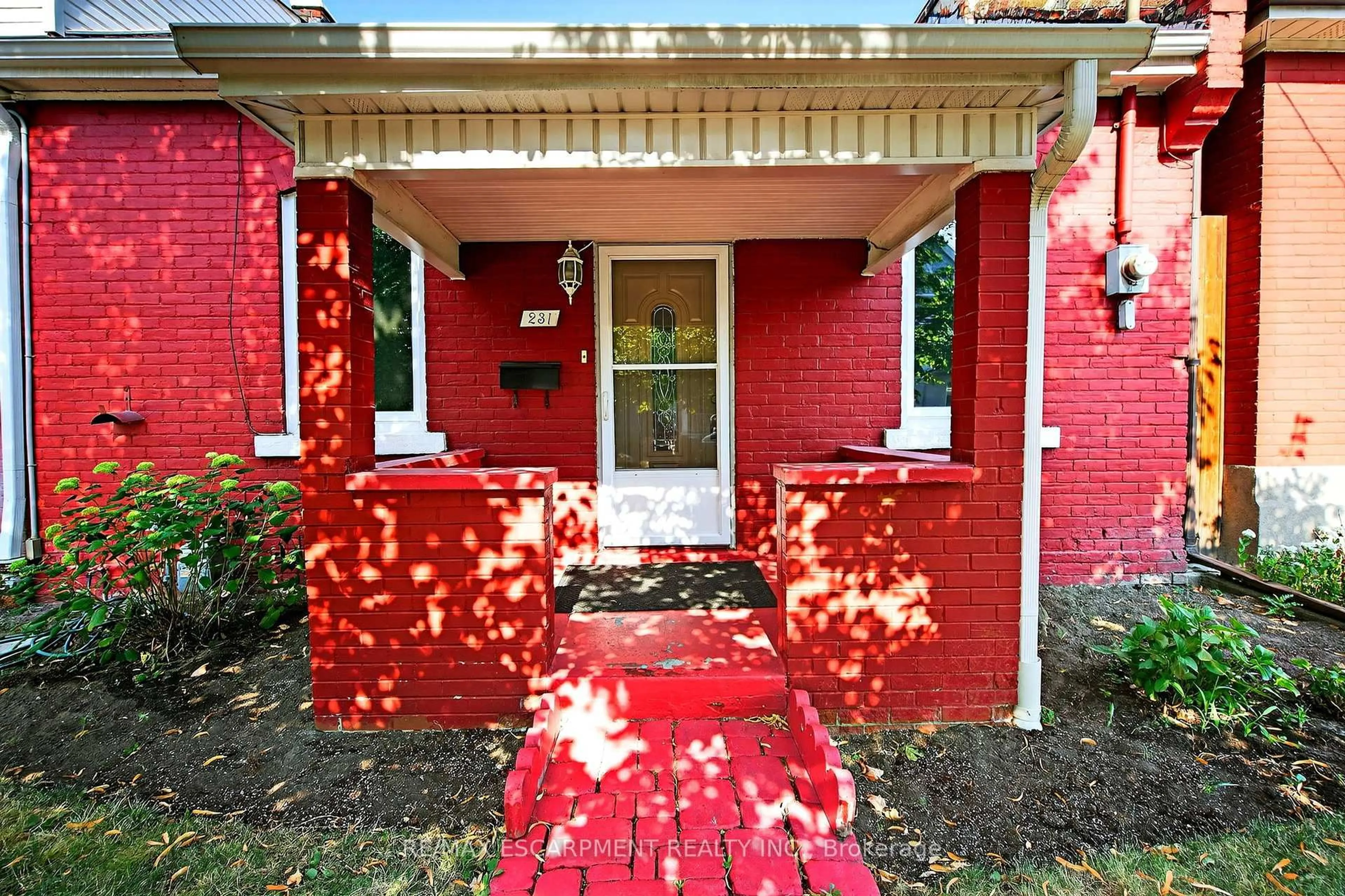 Home with brick exterior material, street for 231 EMERALD St, Hamilton Ontario L8L 5L1