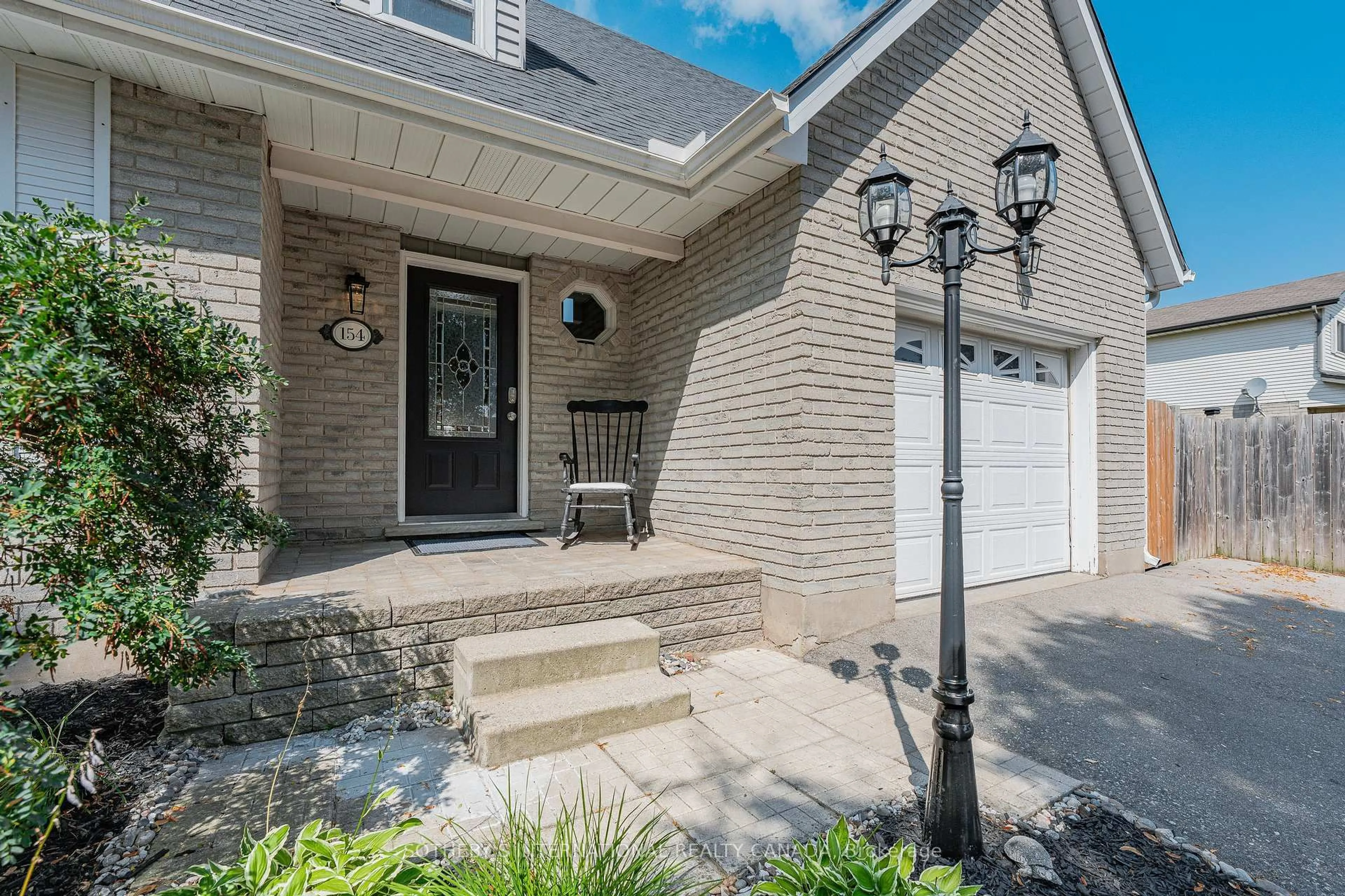 Home with brick exterior material, street for 154 Covington Cres, Kitchener Ontario N2N 2X4