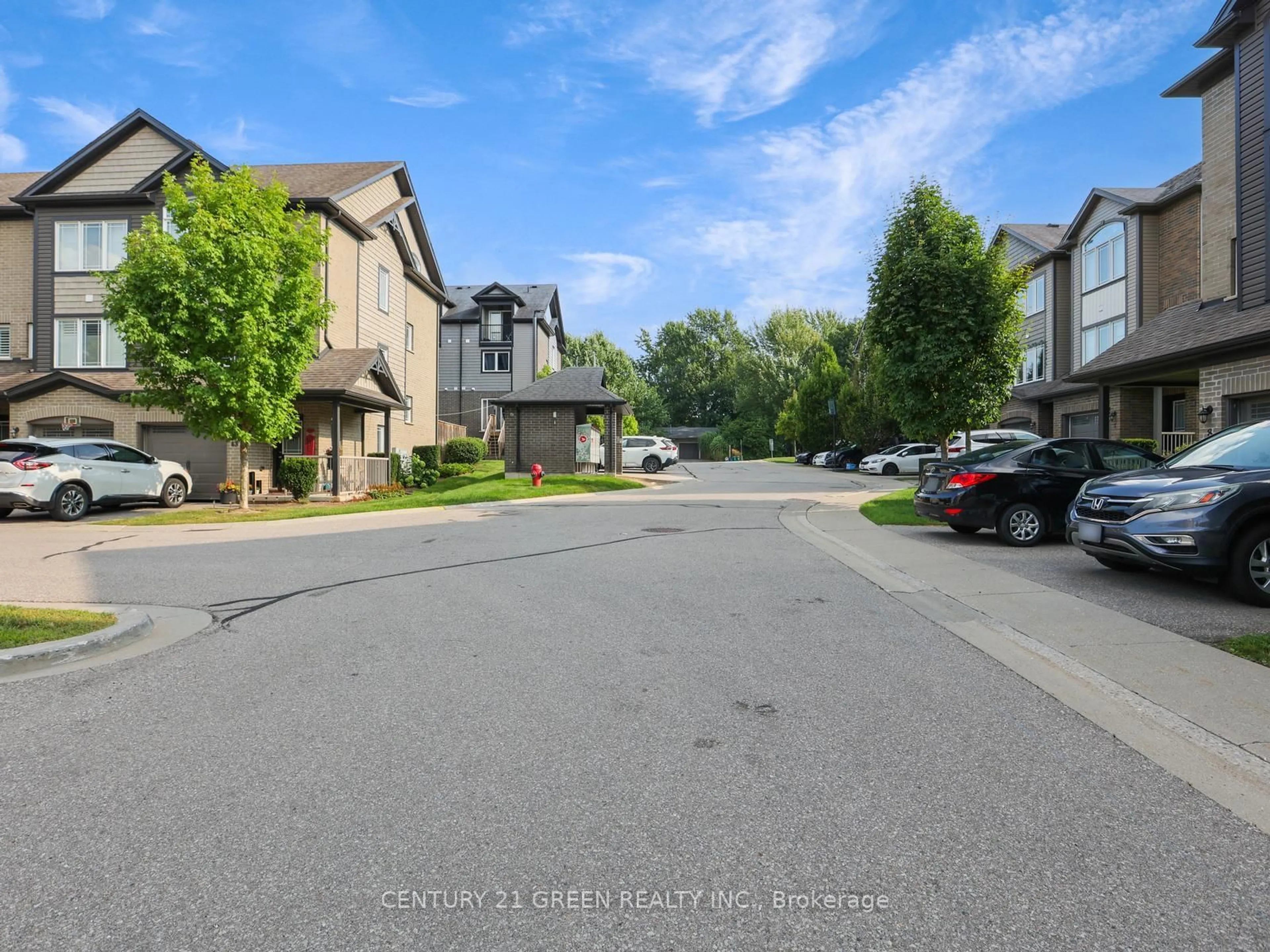 A pic from outside/outdoor area/front of a property/back of a property/a pic from drone, street for 12 Poplar Dr #11, Cambridge Ontario N3C 3X2