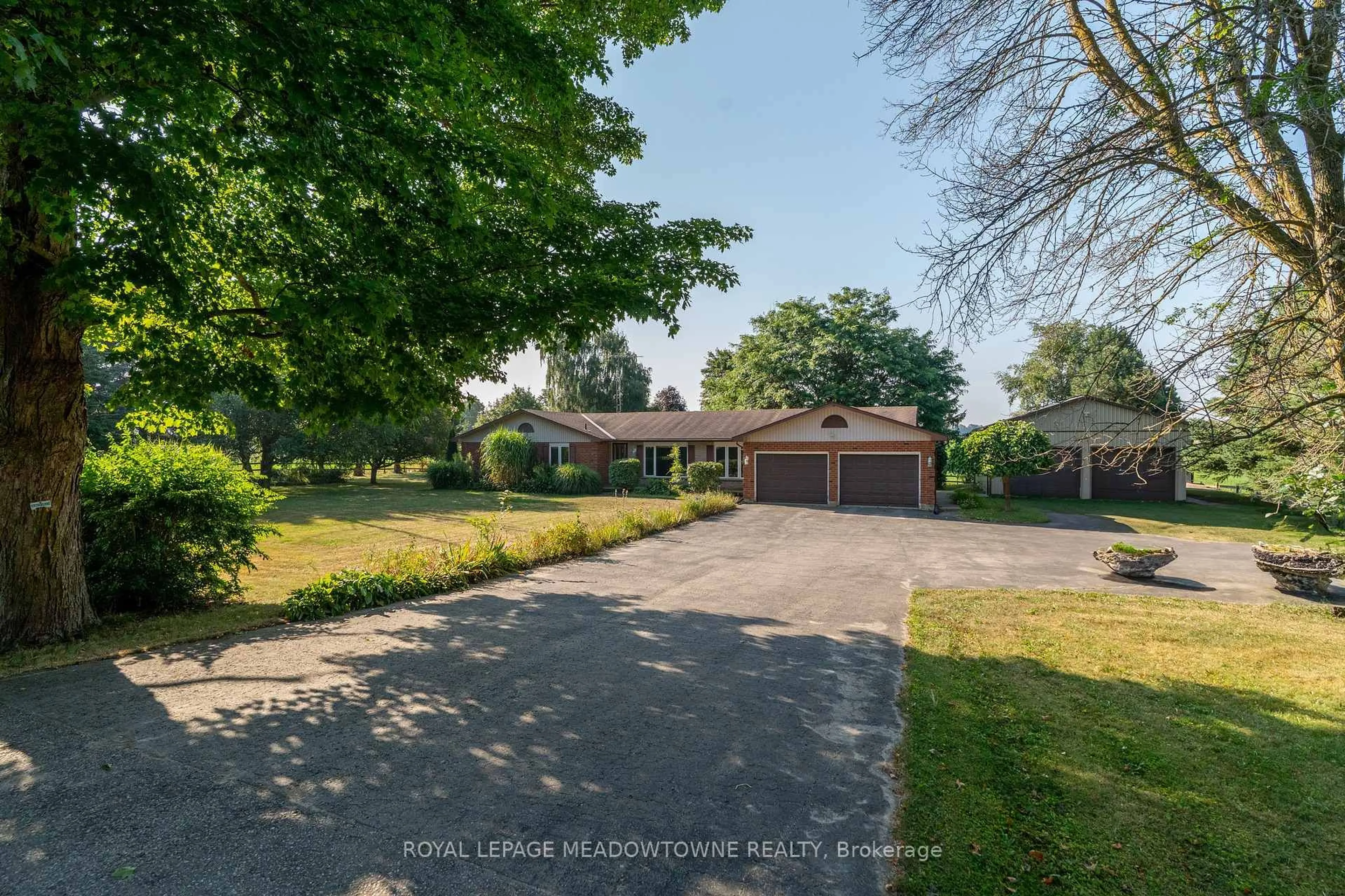 A pic from outside/outdoor area/front of a property/back of a property/a pic from drone, street for 6737 4th Line, Wellington North Ontario N0G 2P0