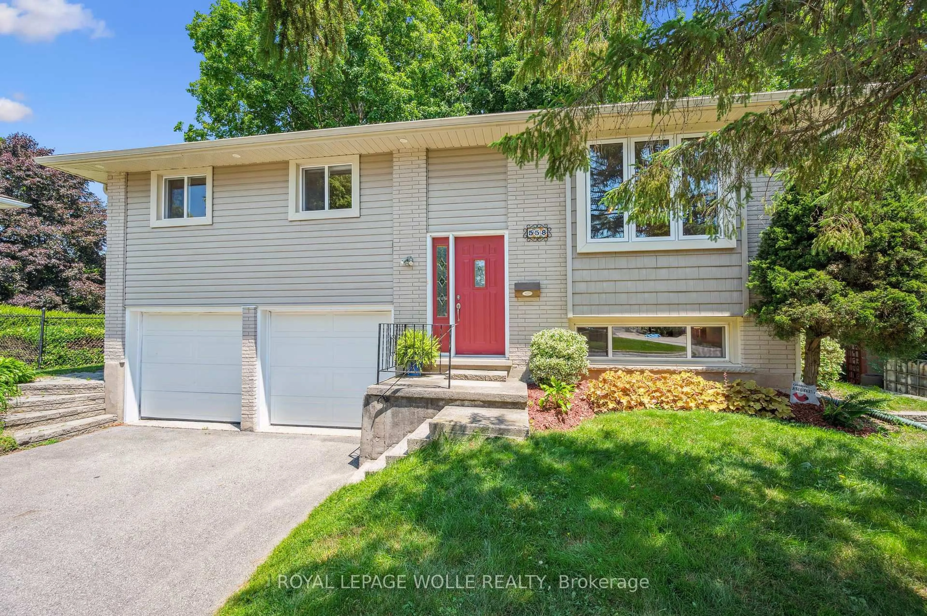 Home with vinyl exterior material, street for 558 Elm Ridge Pl, Waterloo Ontario N2L 4P7