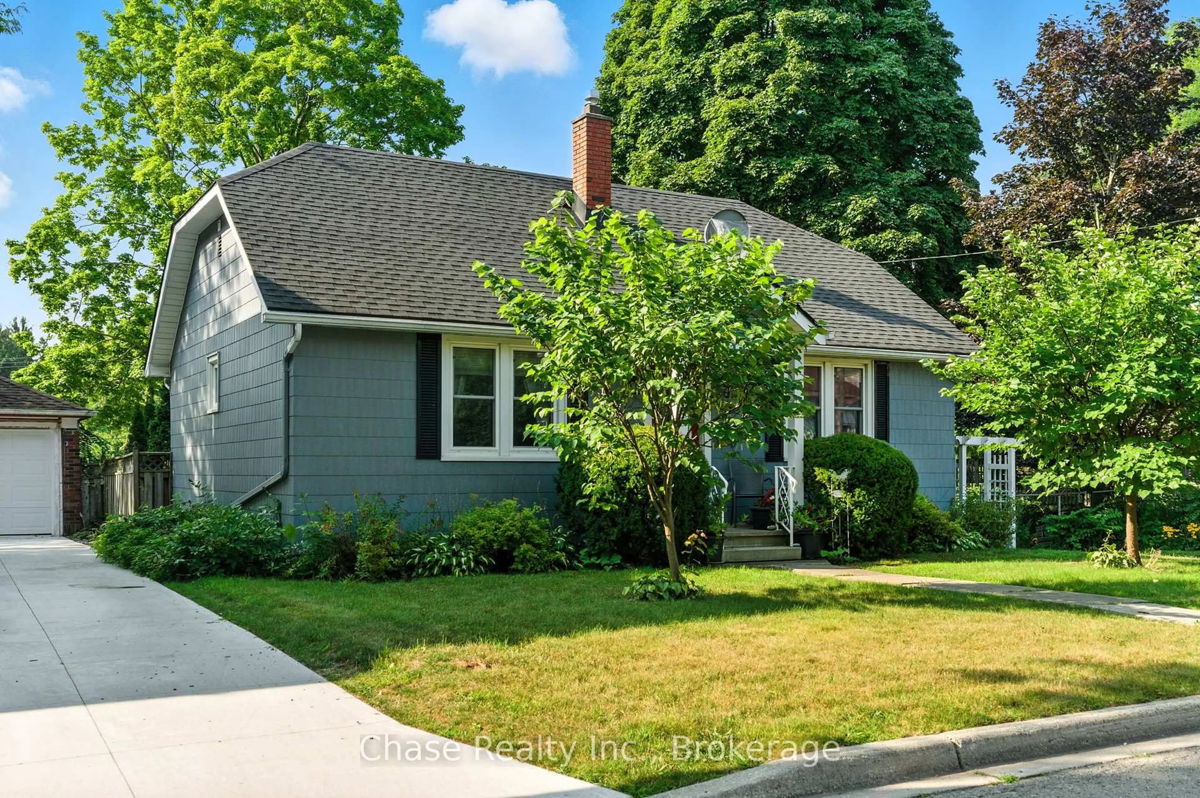 Home with vinyl exterior material, street for 8 Groff St, Norfolk Ontario N3Y 1R3