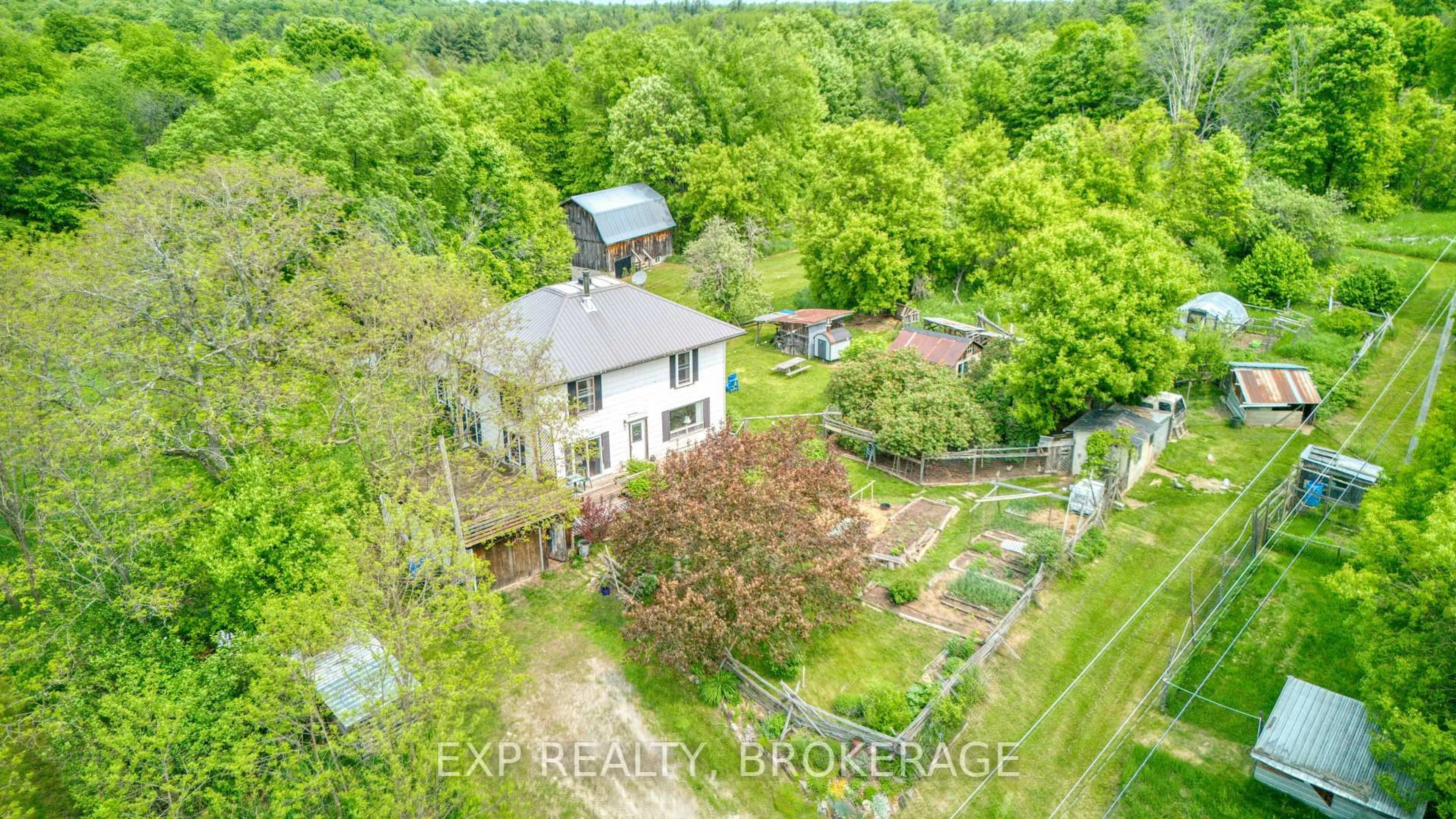 A pic from outside/outdoor area/front of a property/back of a property/a pic from drone, building for 412 MCNAUGHTON Rd, Maberly Ontario K0H 2B0