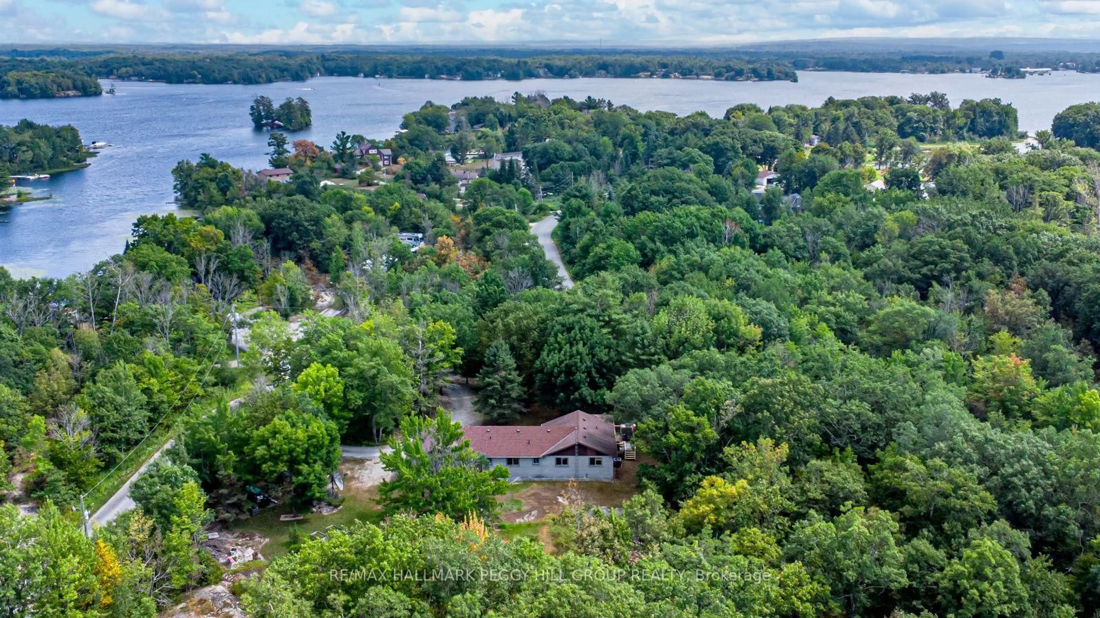 A pic from outside/outdoor area/front of a property/back of a property/a pic from drone, water/lake/river/ocean view for 87 Corrievale Rd, Georgian Bay Ontario L0K 1S0