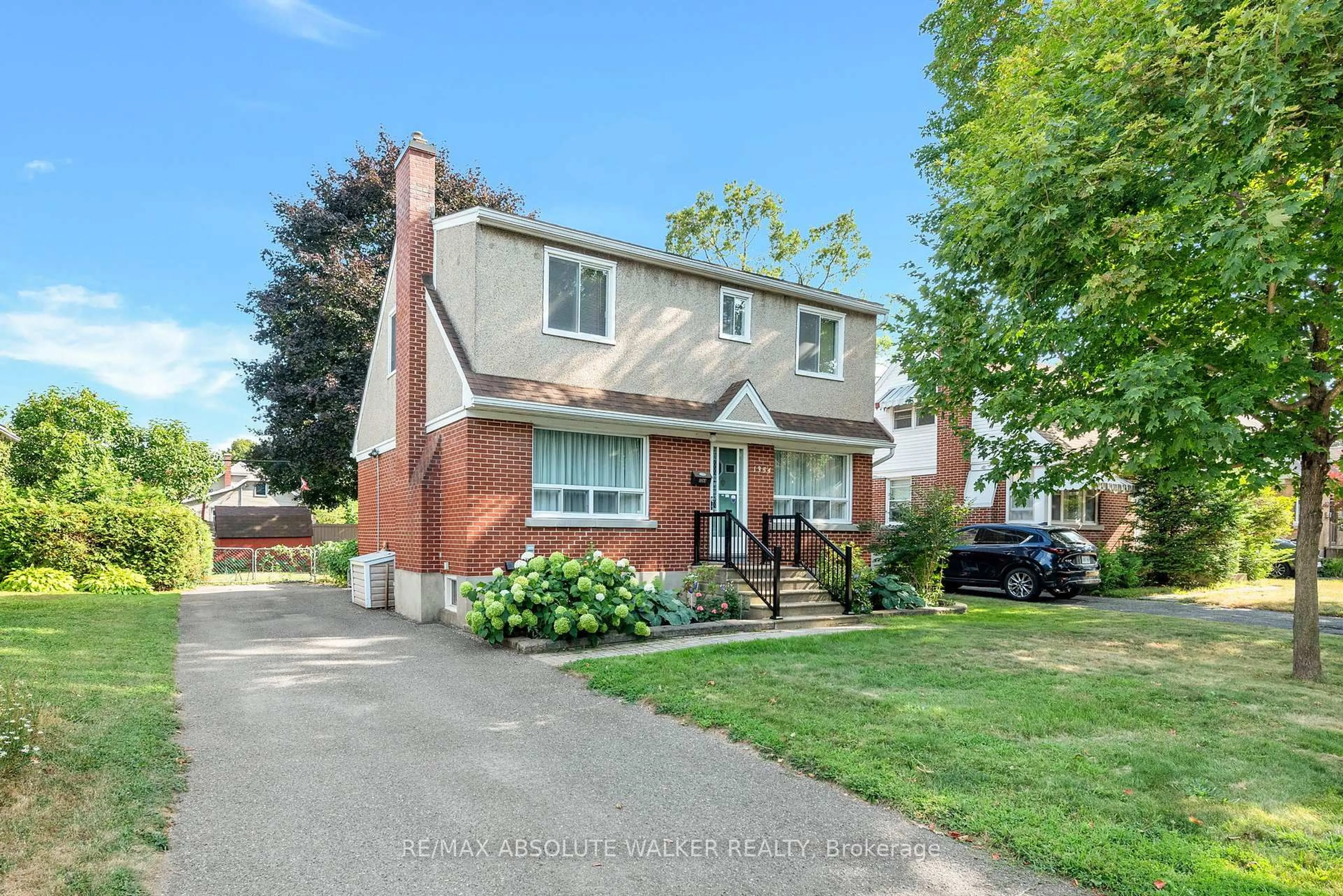 Home with brick exterior material, street for 1354 Larose Ave, Ottawa Ontario K1Z 7X5