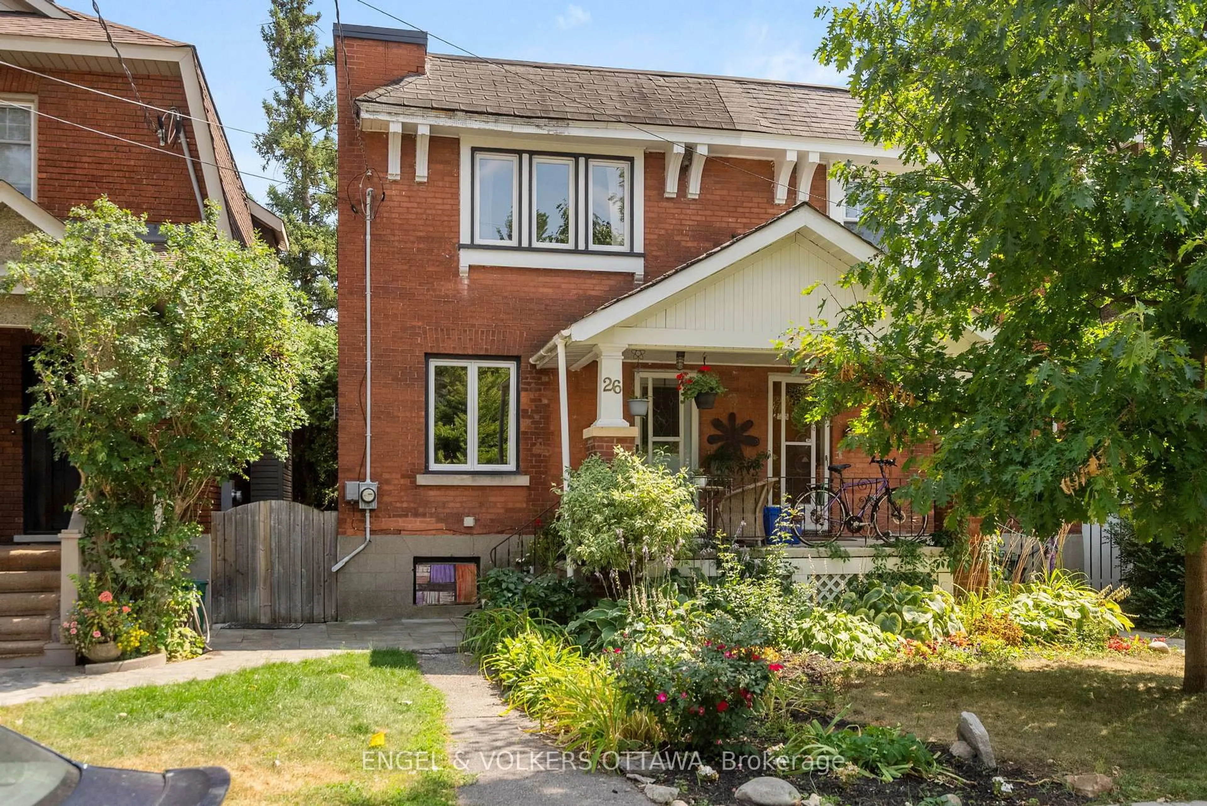 Home with brick exterior material, street for 26 Pansy Ave, Ottawa Ontario K1S 2W6