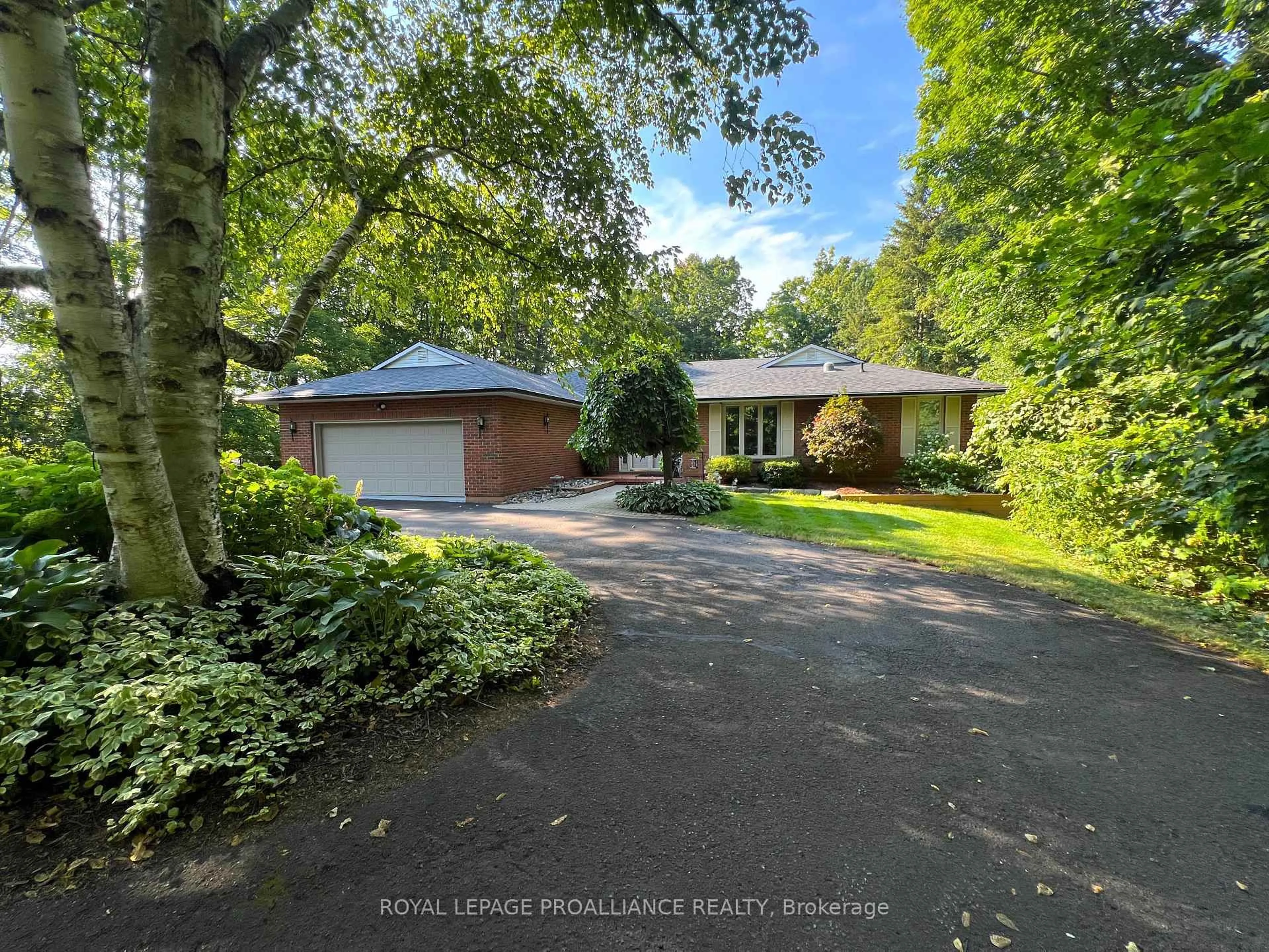 A pic from outside/outdoor area/front of a property/back of a property/a pic from drone, street for 1712 County Rd 3, Prince Edward County Ontario K0K 1L0