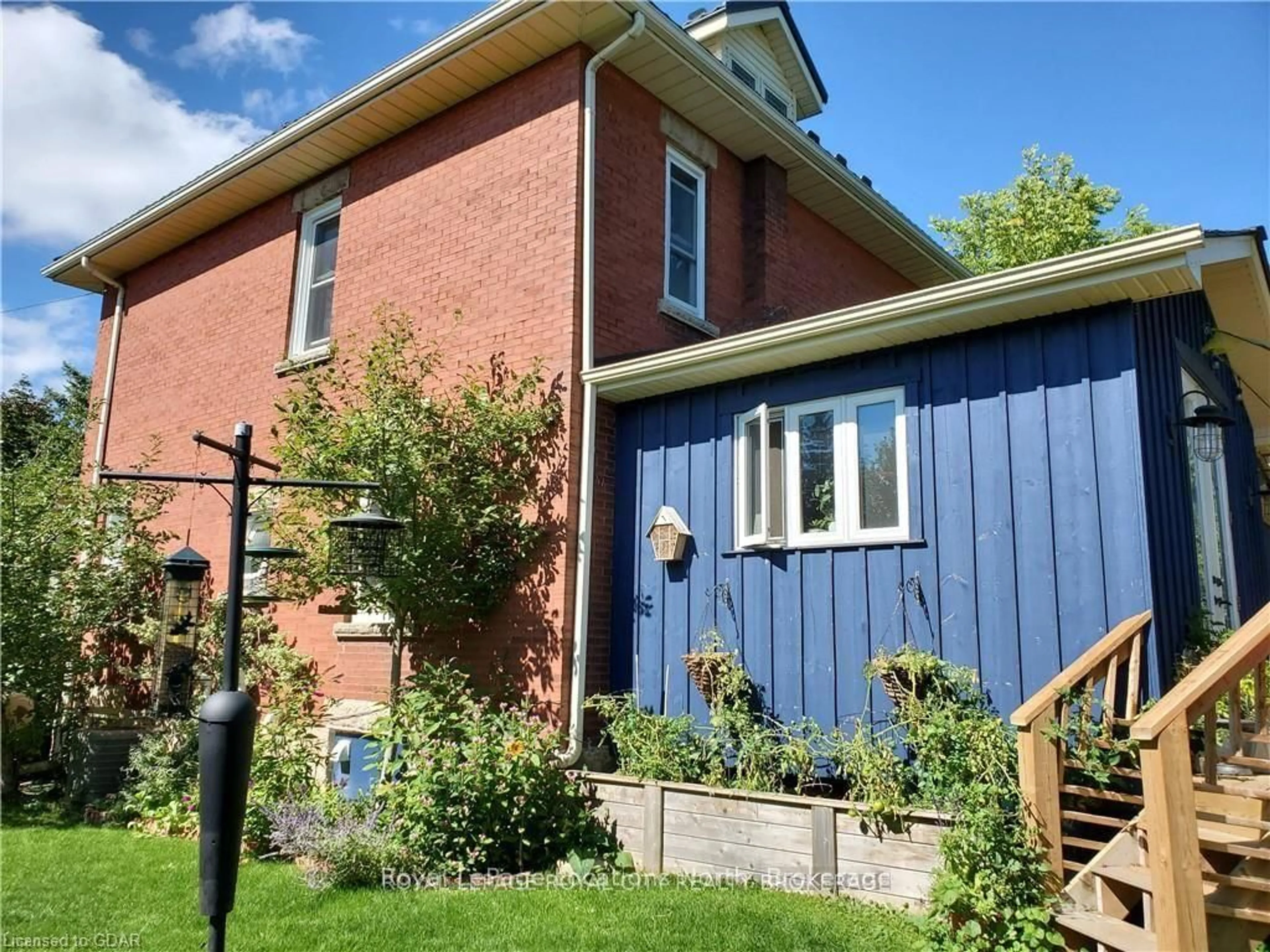 Home with brick exterior material, street for 627 Eramosa Rd, Guelph Ontario N1E 2N7
