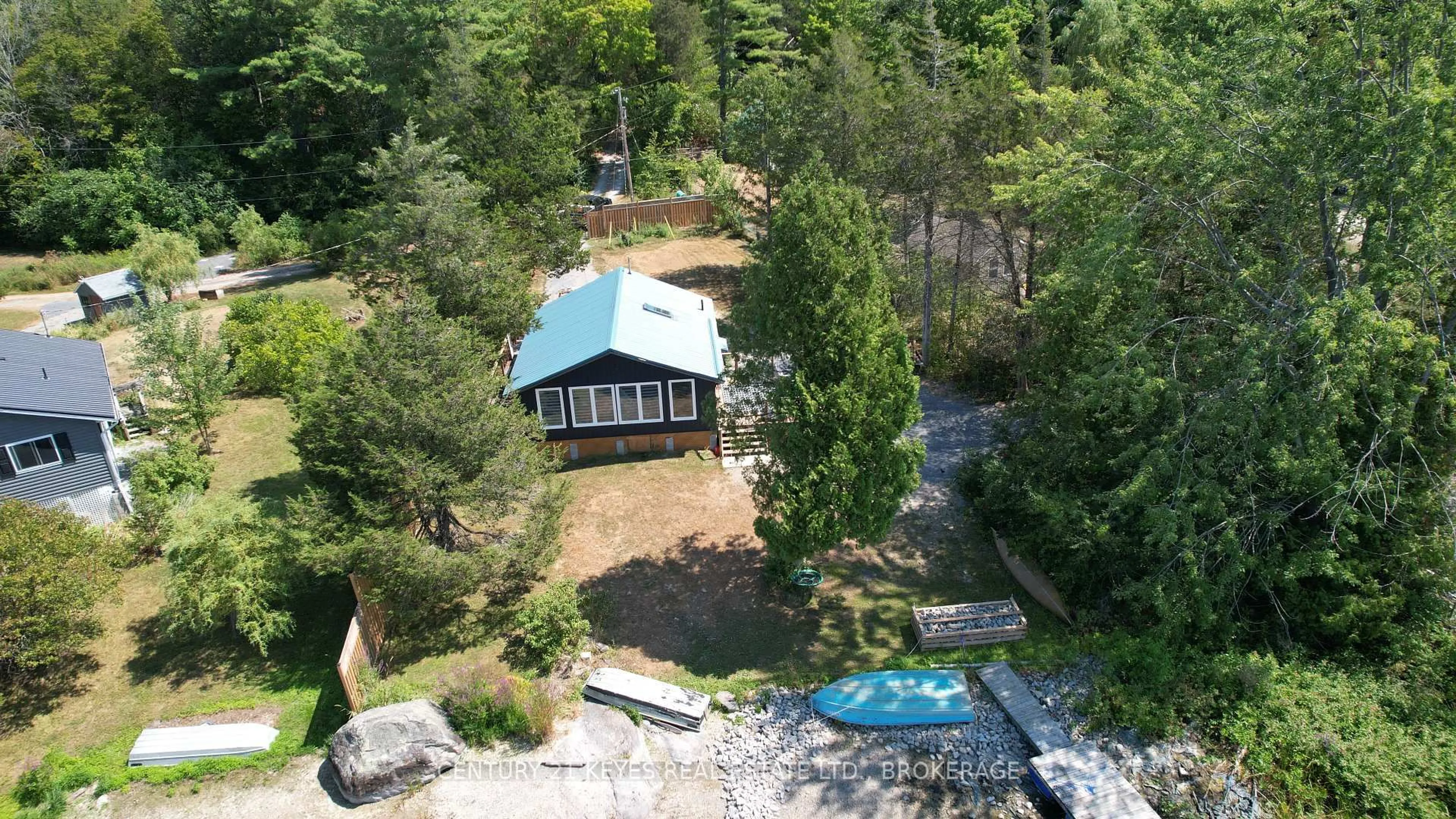 A pic from outside/outdoor area/front of a property/back of a property/a pic from drone, water/lake/river/ocean view for 910 Hummingbird Lane, Leeds and the Thousand Islands Ontario K0E 1L0