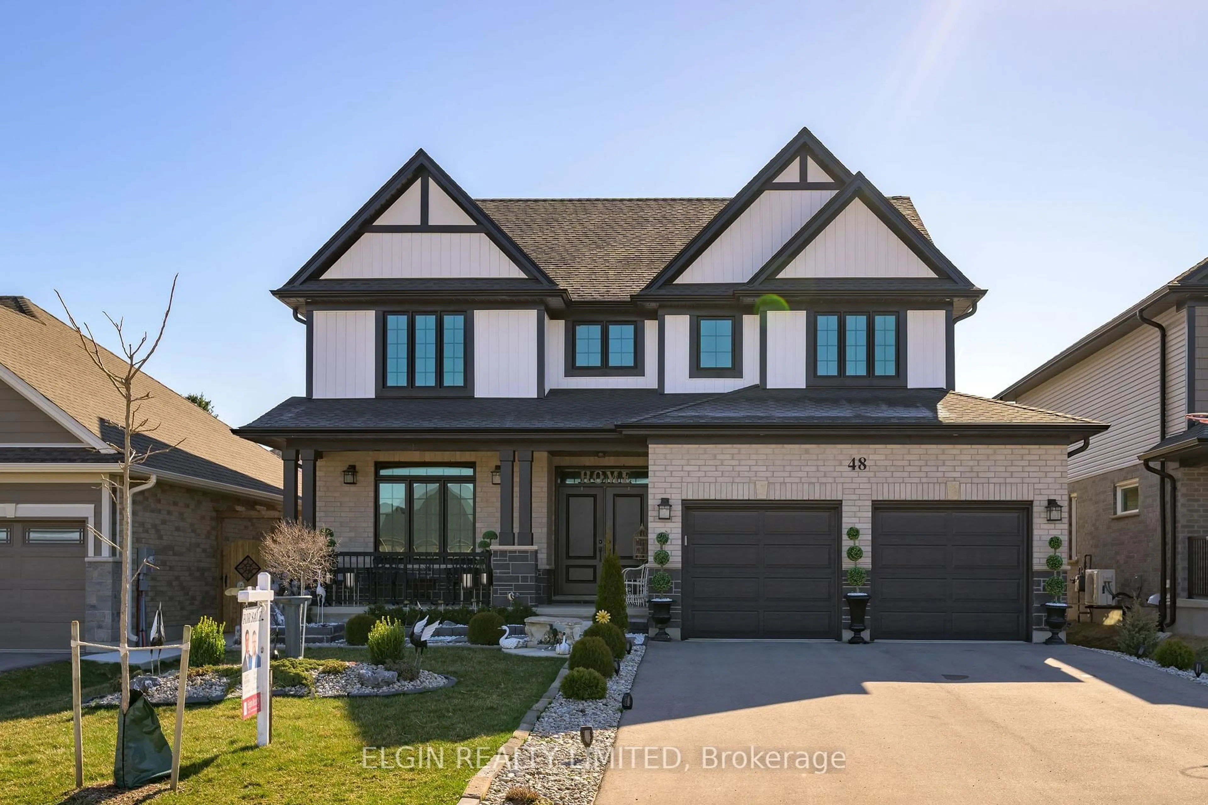 Home with brick exterior material, street for 48 Snowy Owl Tr, Central Elgin Ontario N5R 0M7