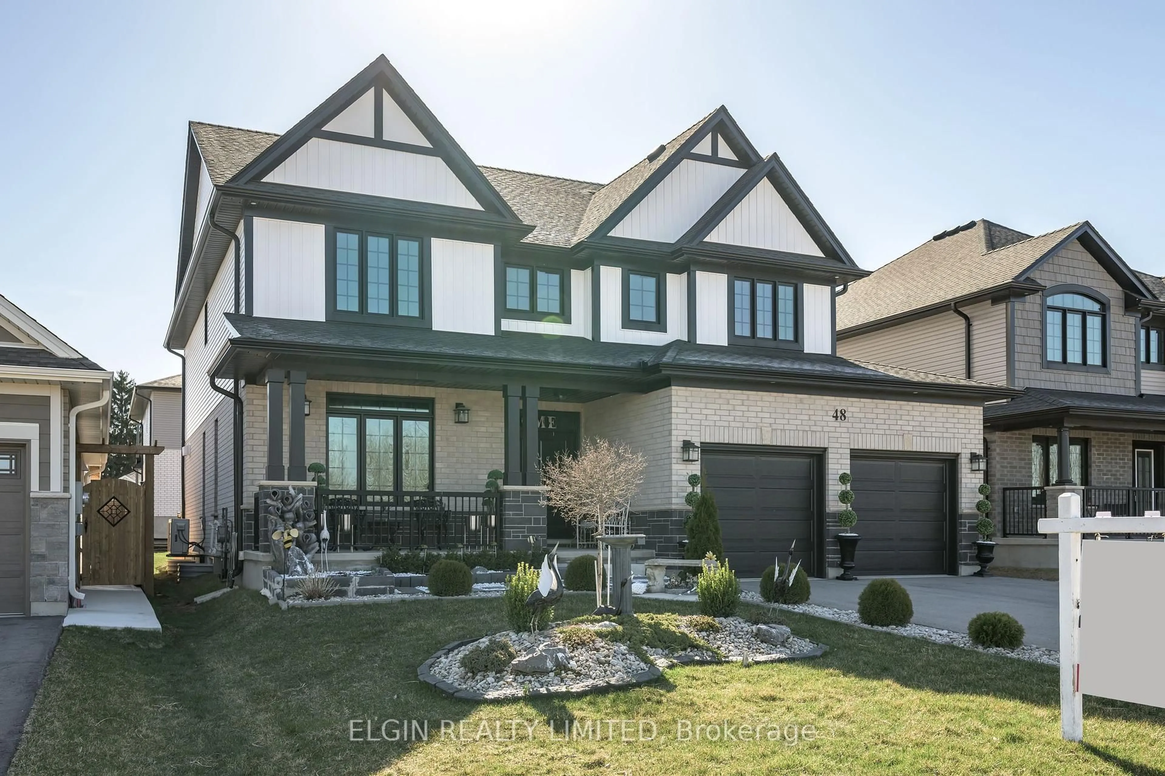 Home with brick exterior material, street for 48 Snowy Owl Tr, Central Elgin Ontario N5R 0M7