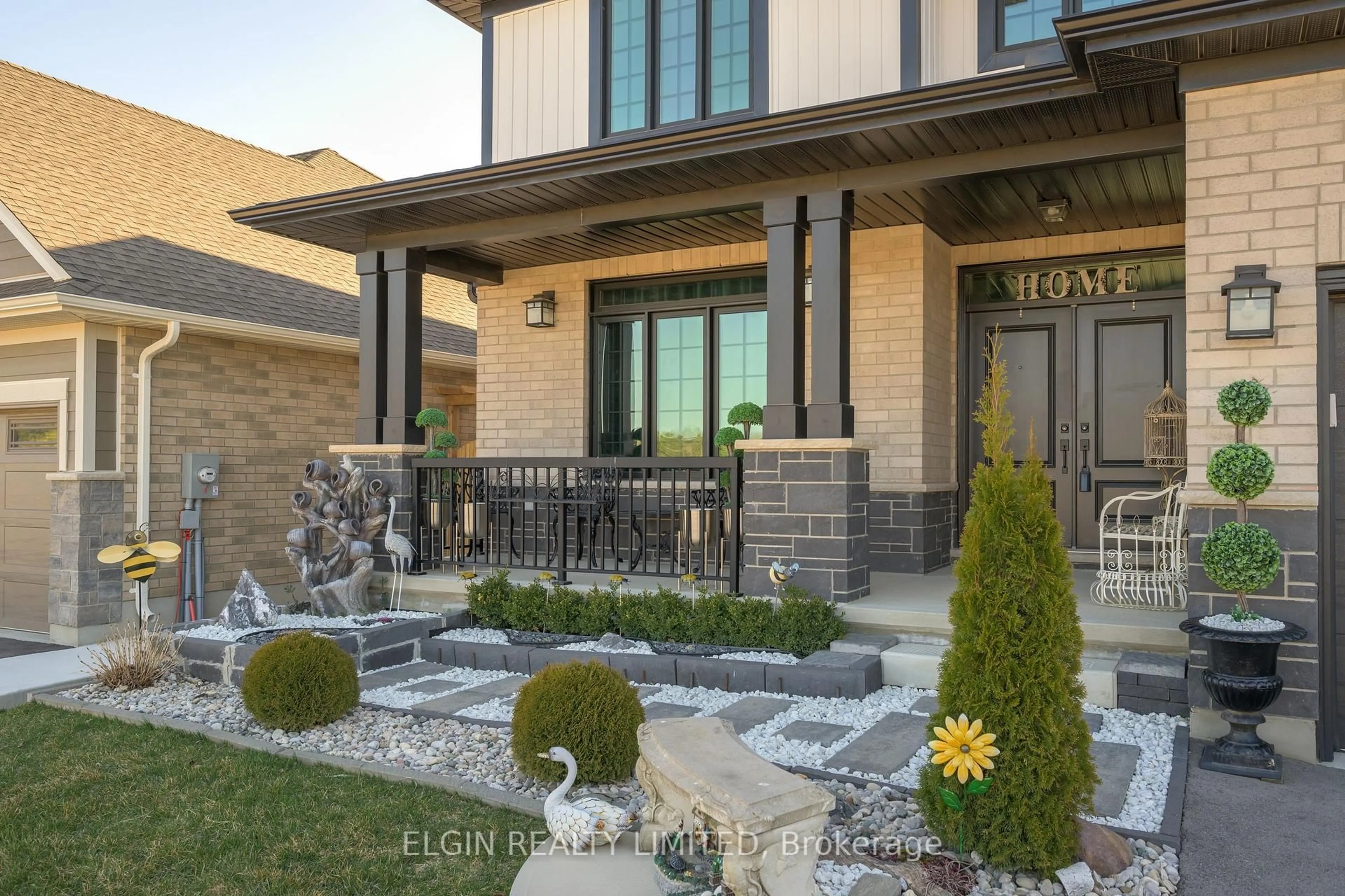 Home with brick exterior material, street for 48 Snowy Owl Tr, Central Elgin Ontario N5R 0M7