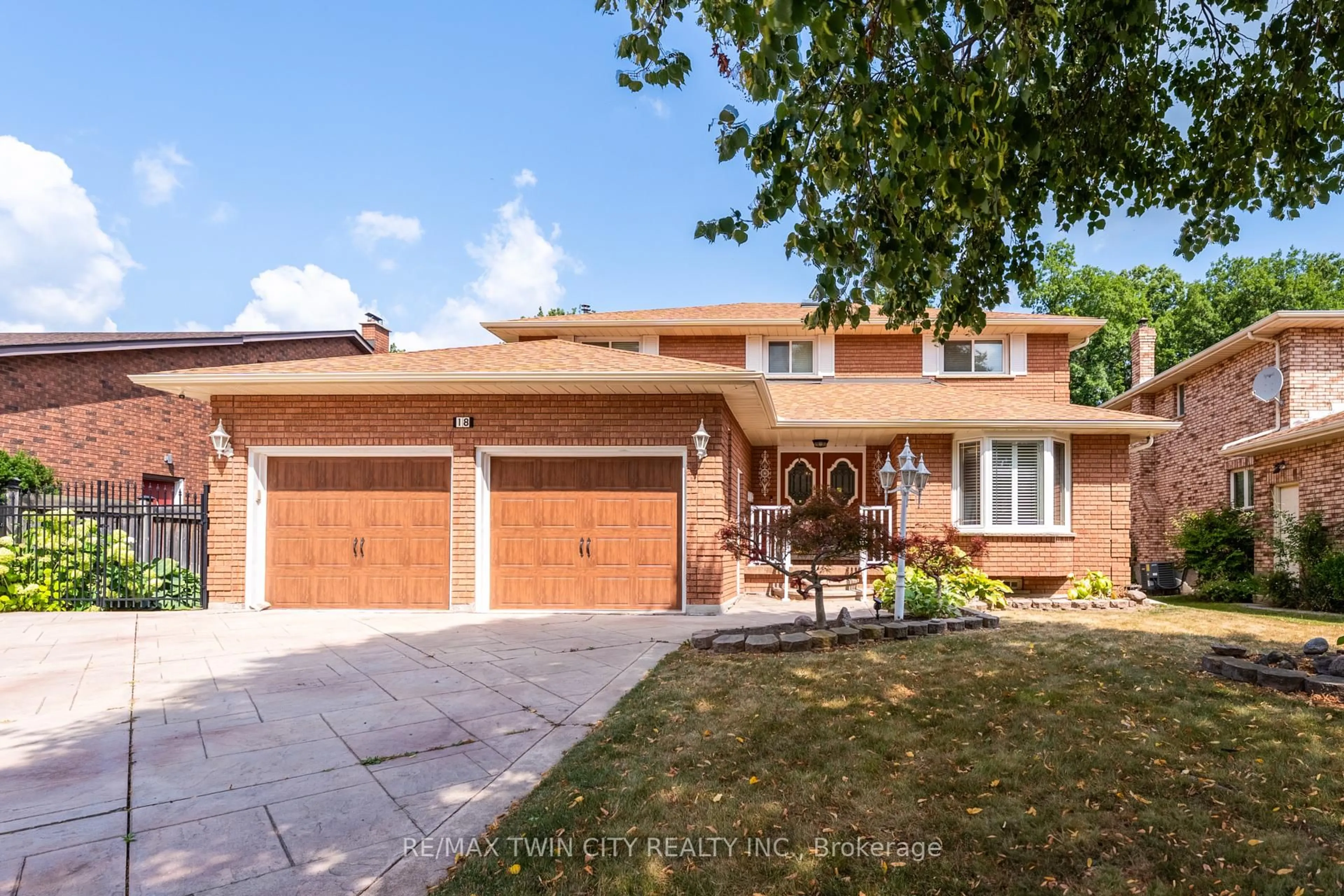 Home with brick exterior material, street for 18 Riva Rdge, Brantford Ontario N3P 1S2