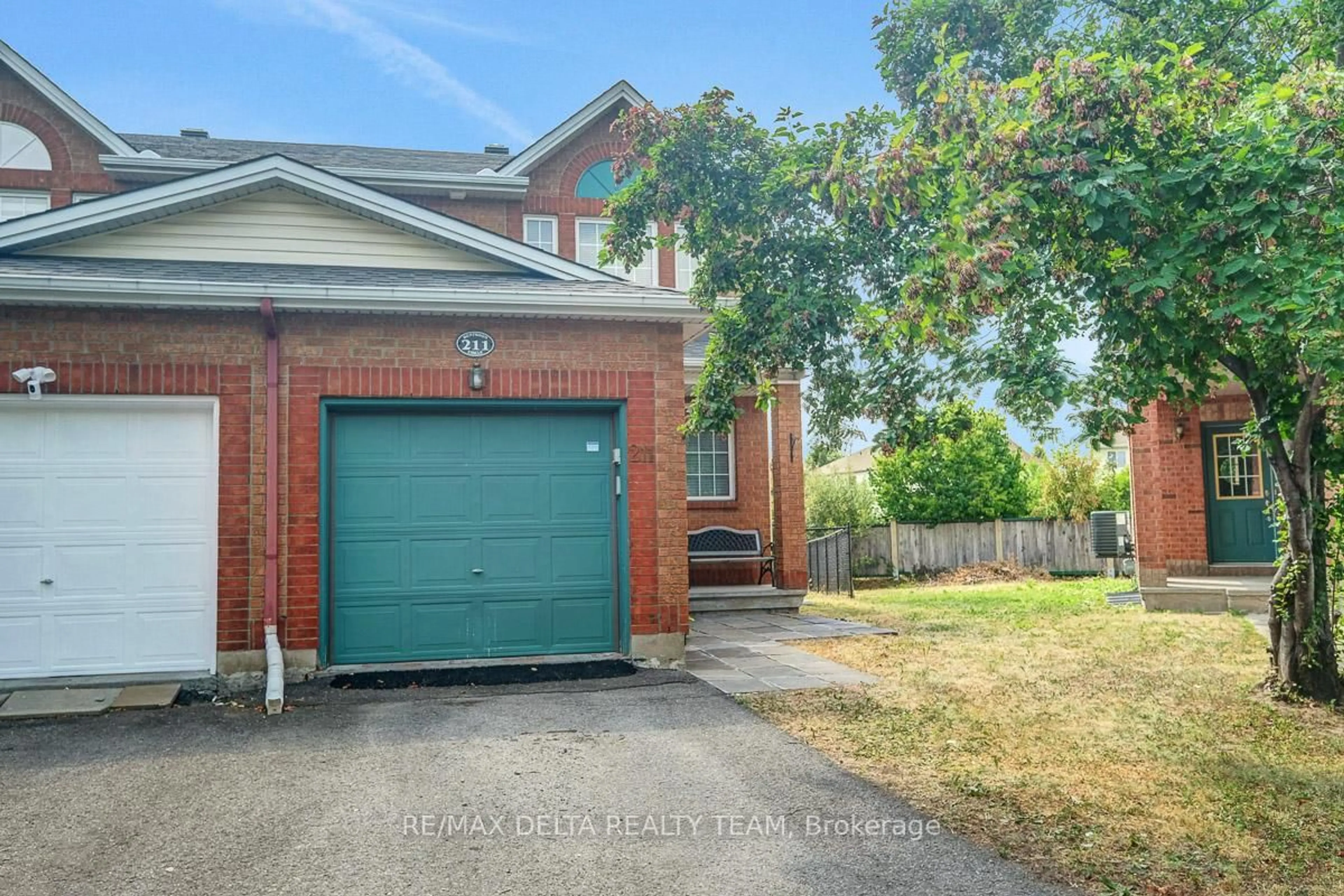 A pic from outside/outdoor area/front of a property/back of a property/a pic from drone, street for 211 Duntroon Circ, Ottawa Ontario K1T 4C9