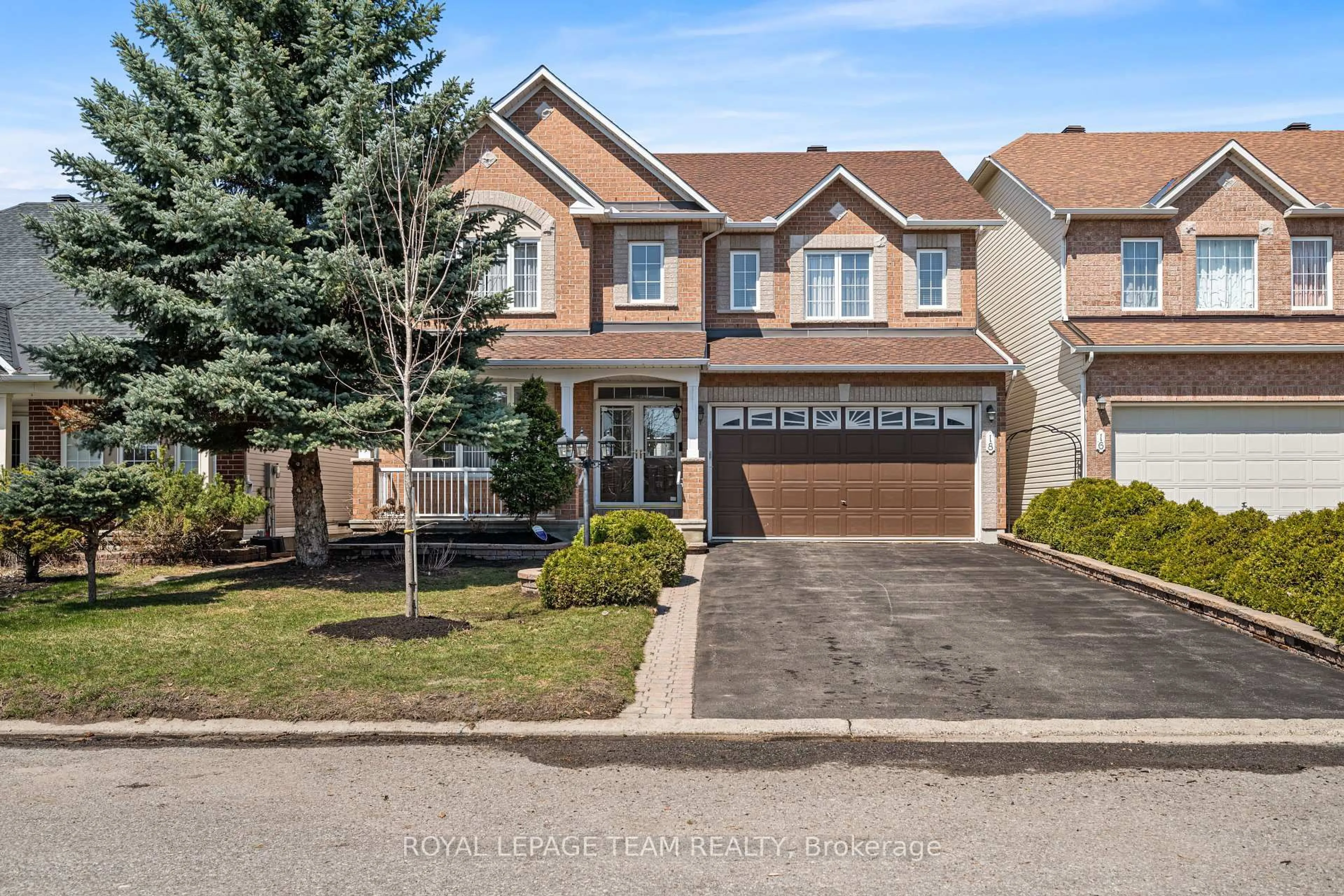 Home with brick exterior material, street for 18 Tierney Dr, Nepean Ontario K2J 4W2
