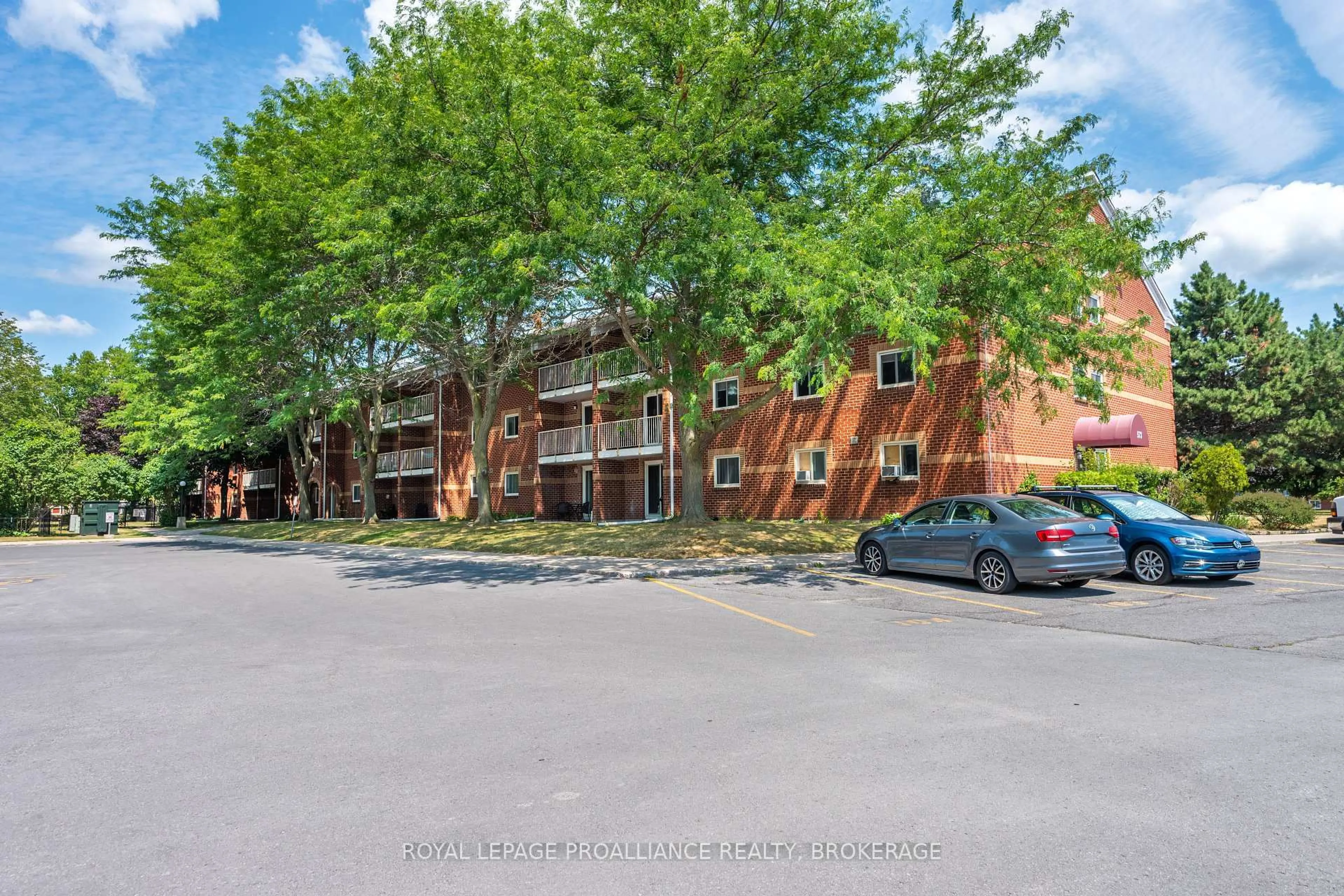 A pic from outside/outdoor area/front of a property/back of a property/a pic from drone, street for 573 Armstrong Rd #314, Kingston Ontario K7M 8J8