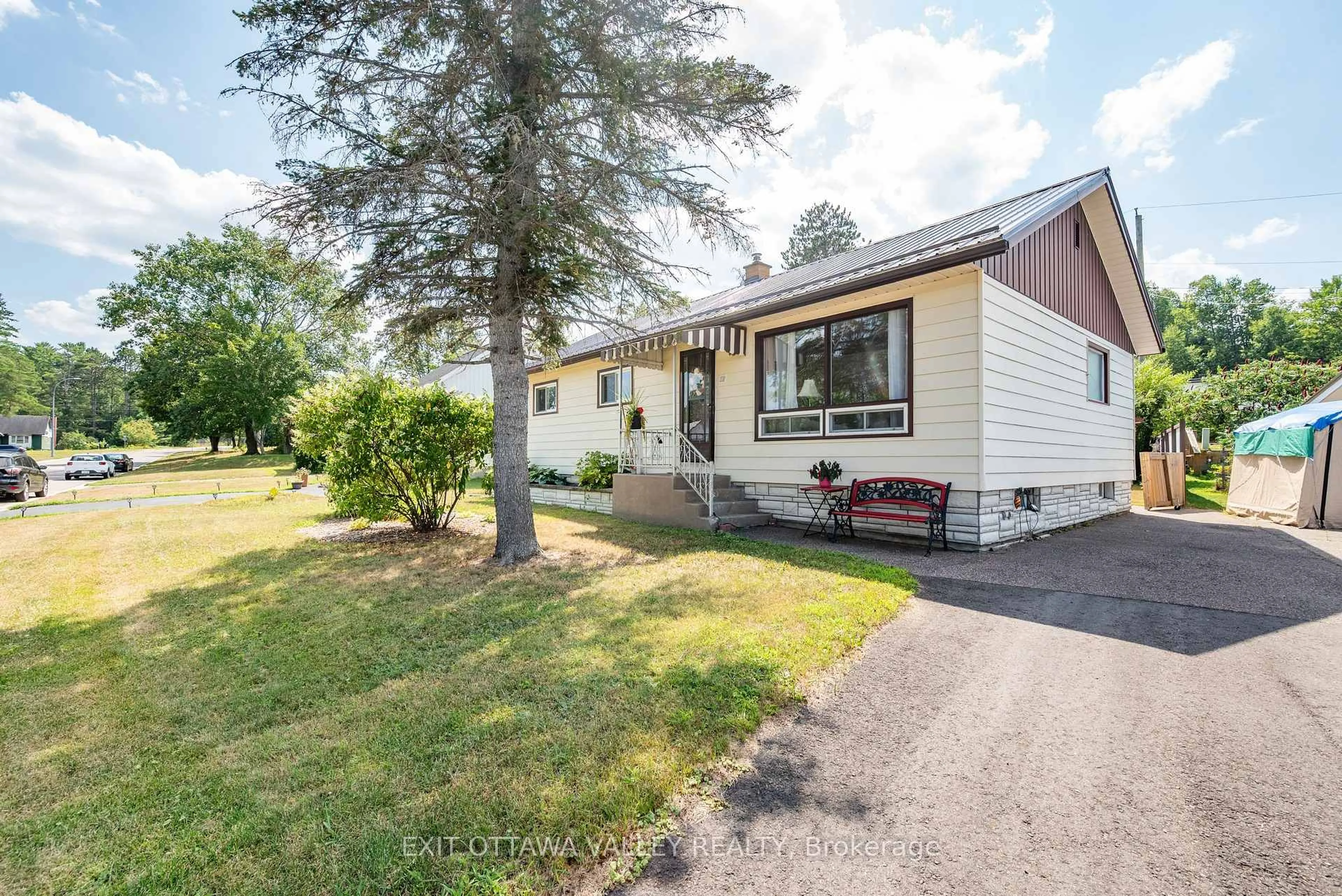 Home with vinyl exterior material, street for 12 Summit St, Deep River Ontario K0J 1P0