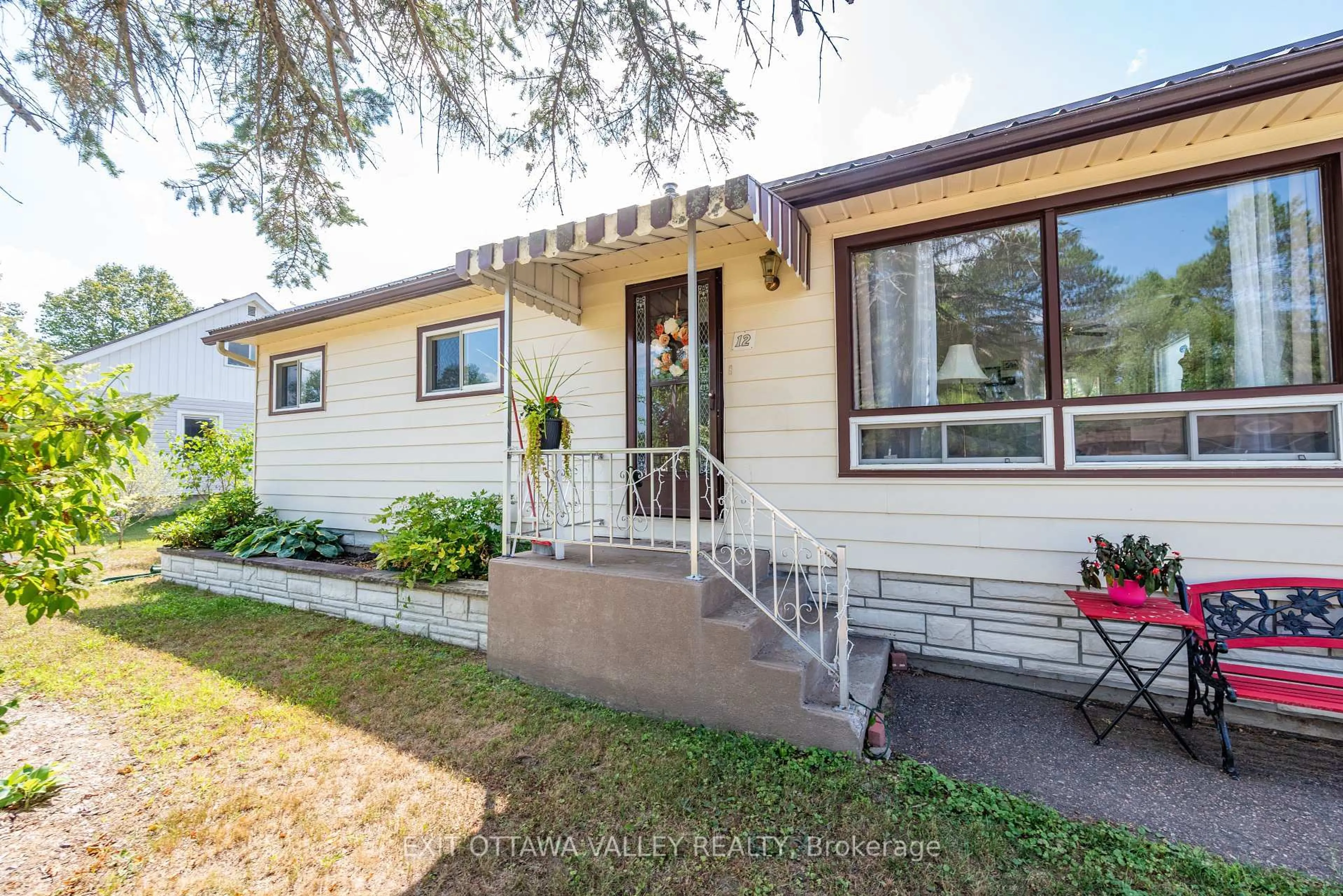 Home with vinyl exterior material, street for 12 Summit St, Deep River Ontario K0J 1P0