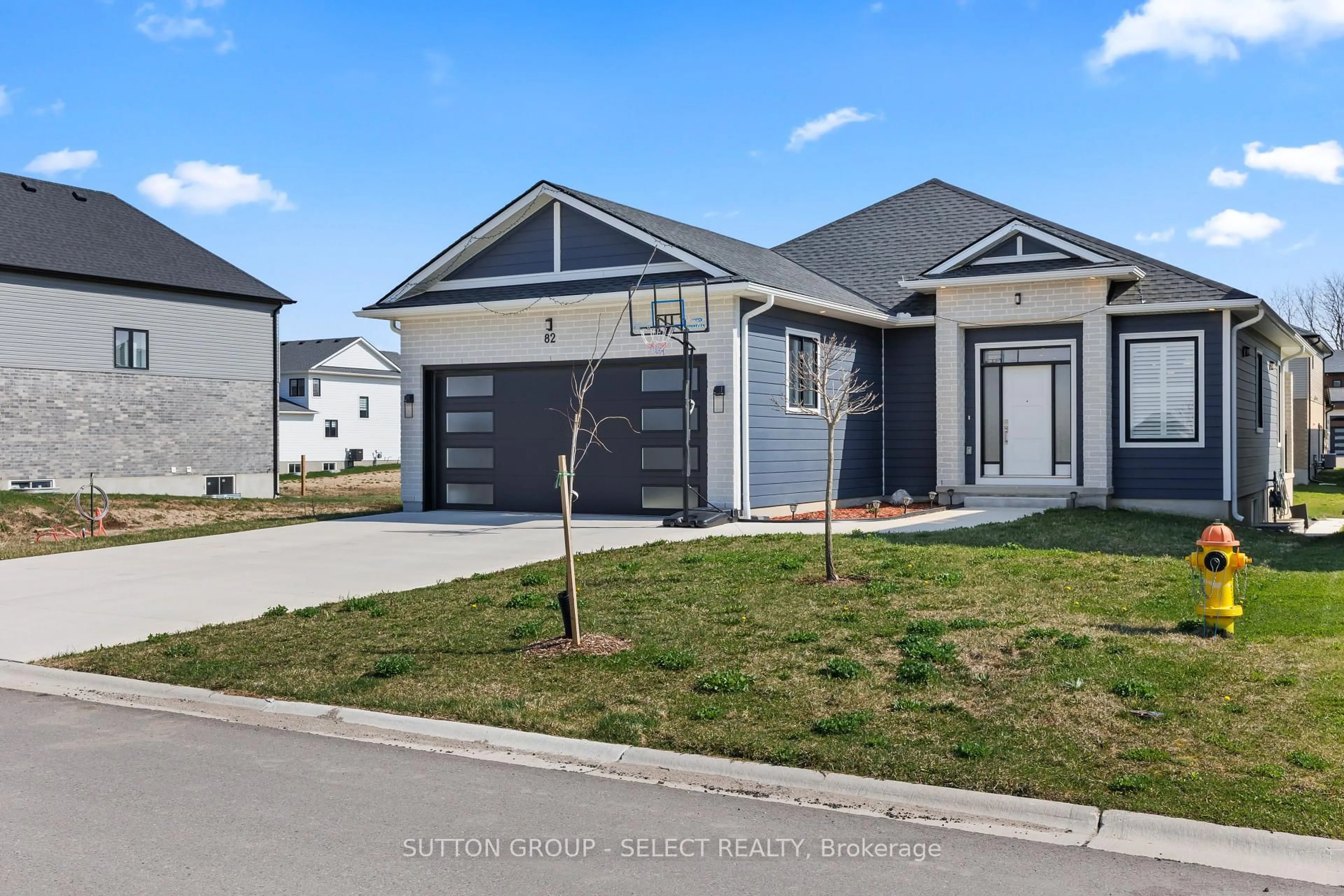 Home with vinyl exterior material, street for 82 Wayside Lane, Southwold Ontario N5P 3T2
