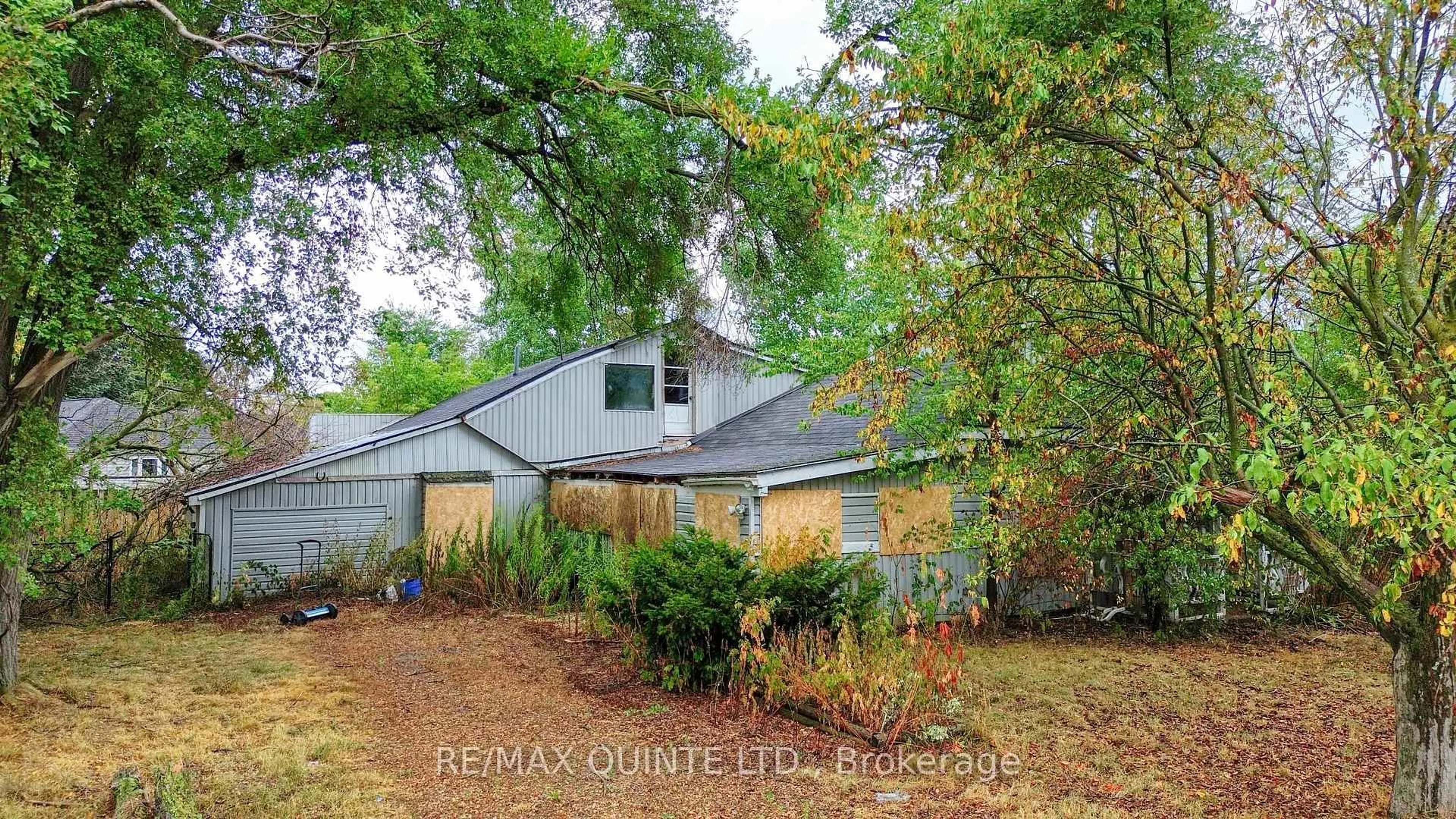 A pic from outside/outdoor area/front of a property/back of a property/a pic from drone, street for 74 County Rd 3, Prince Edward County Ontario K8N 0L2