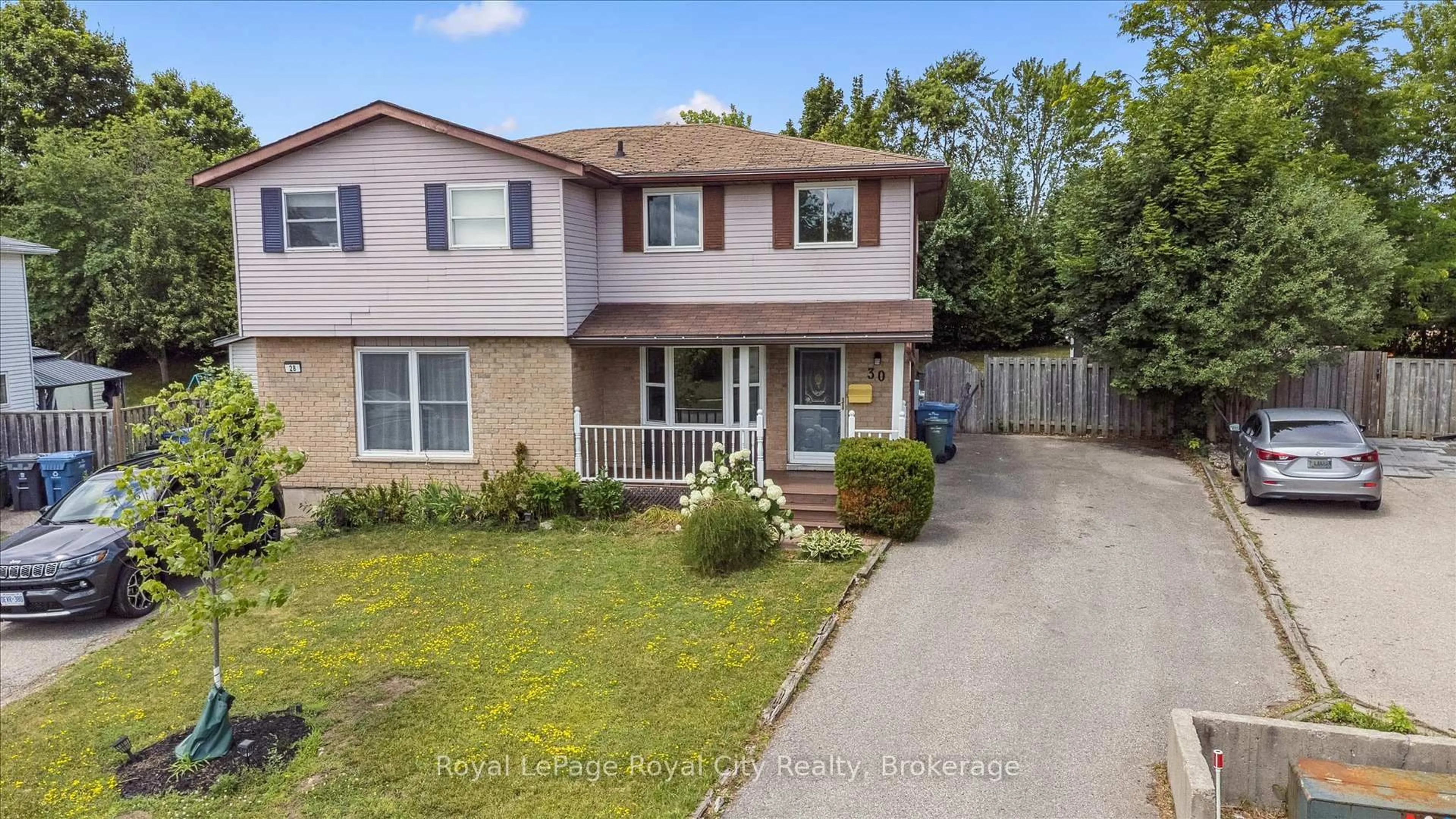 Home with brick exterior material, street for 30 Leacock Ave, Guelph Ontario N1E 6R1