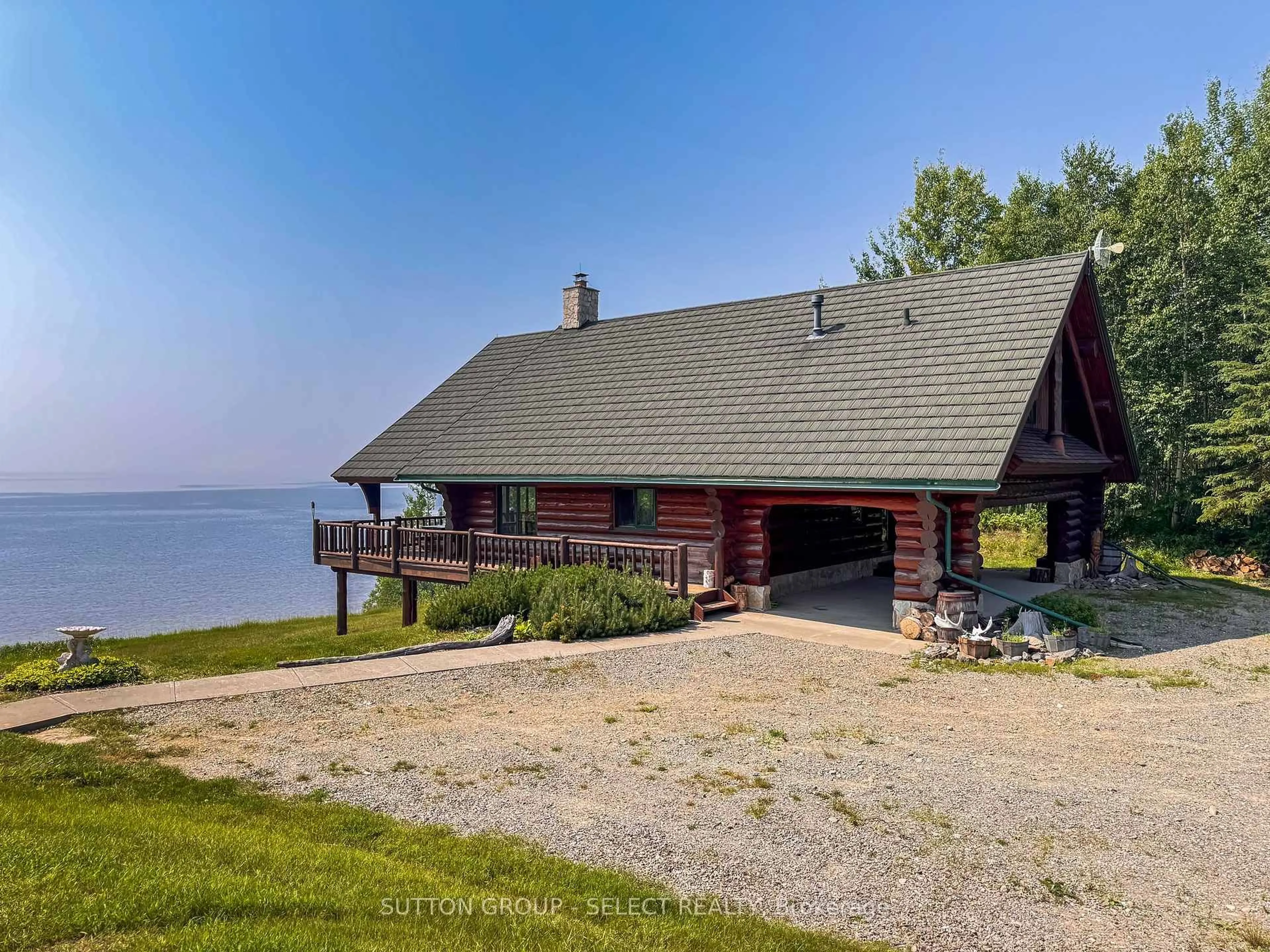 A pic from outside/outdoor area/front of a property/back of a property/a pic from drone, water/lake/river/ocean view for 21 Peter Dr, Greenstone Ontario P0T 1G0