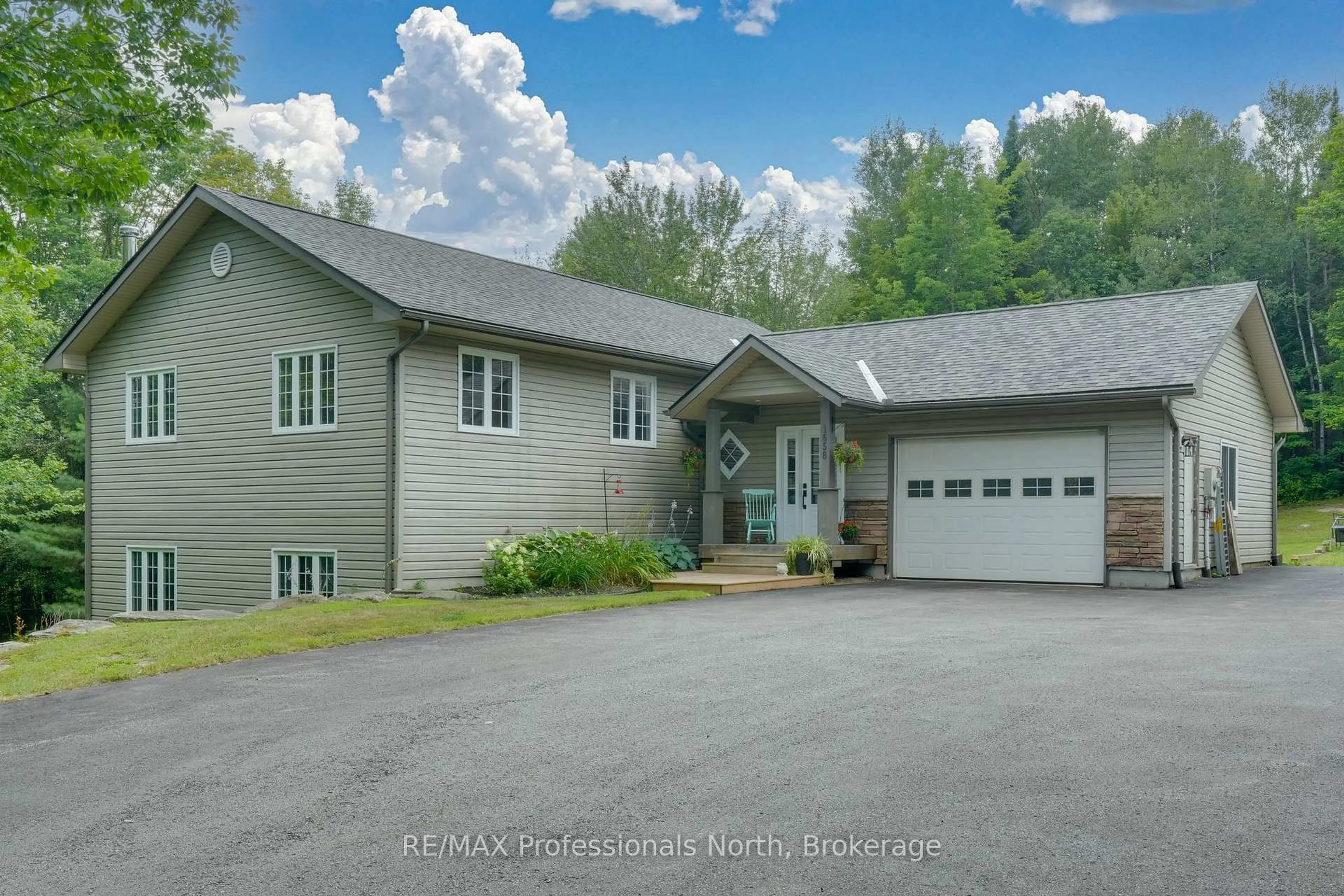 A pic from outside/outdoor area/front of a property/back of a property/a pic from drone, unknown for 1658 60 Highway, Huntsville Ontario P1H 1A2