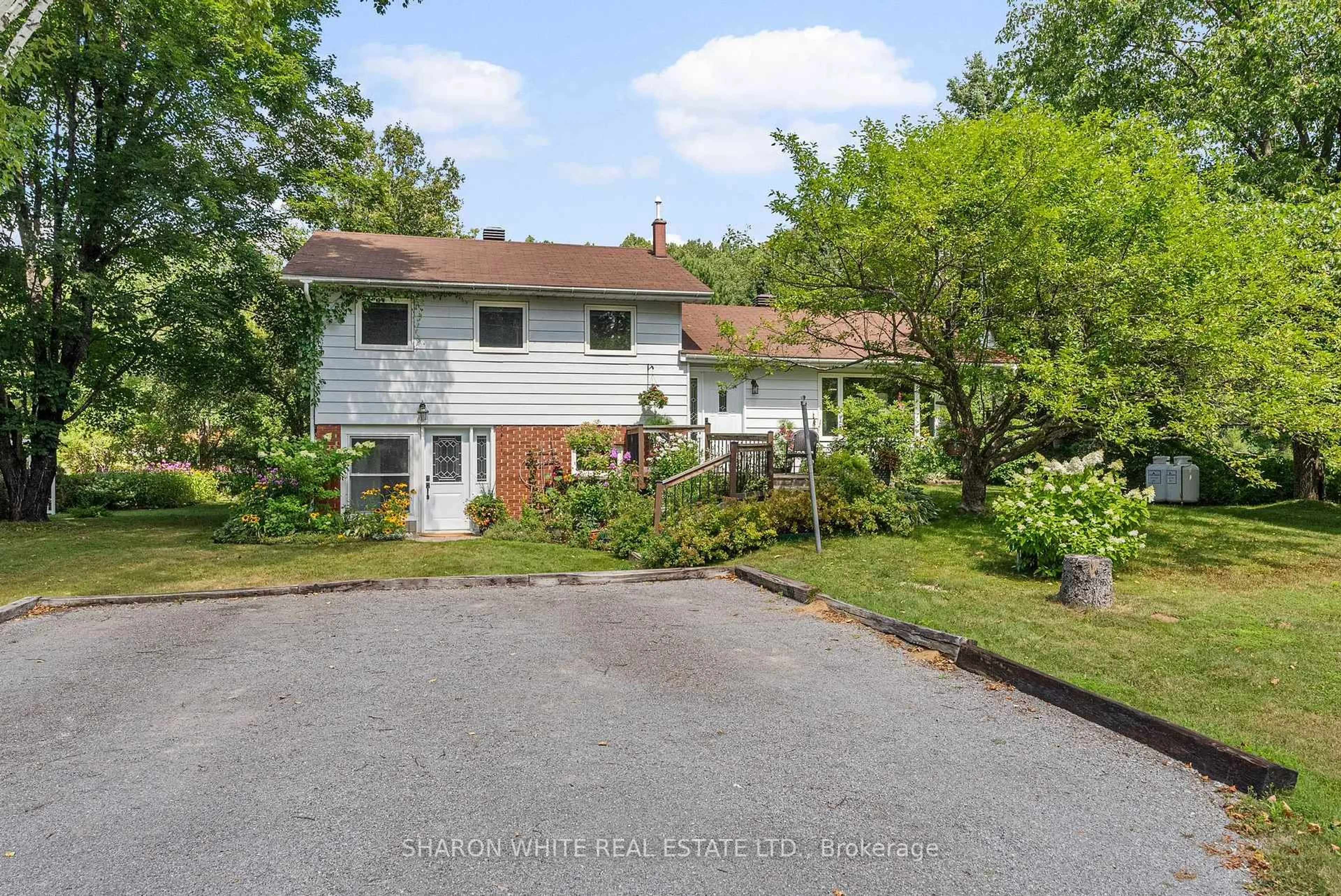 A pic from outside/outdoor area/front of a property/back of a property/a pic from drone, street for 63 Buck Hill Rd, Bancroft Ontario K0L 1C0