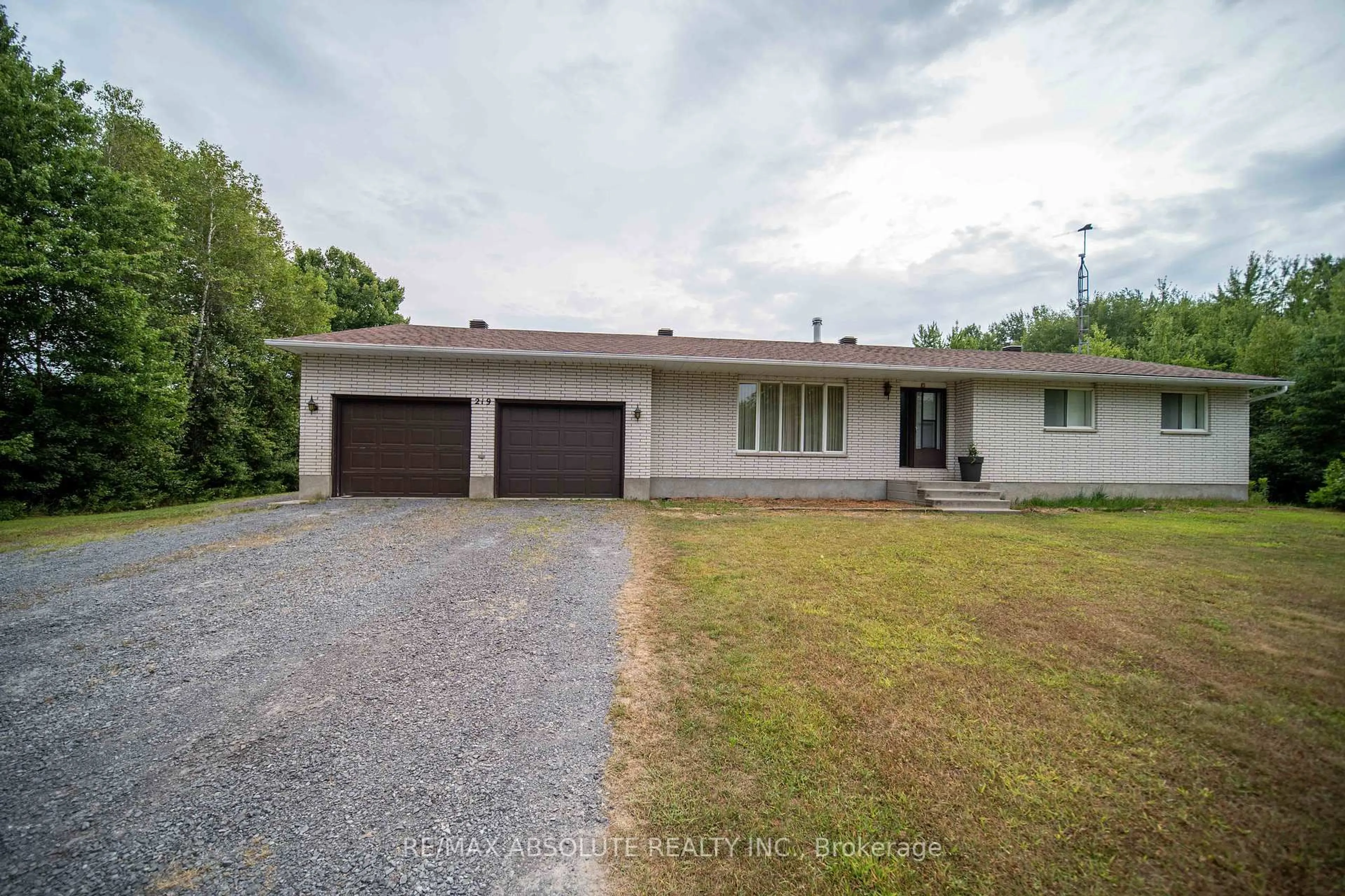 A pic from outside/outdoor area/front of a property/back of a property/a pic from drone, street for 219 St Thomas Rd, Russell Ontario K0A 3H0