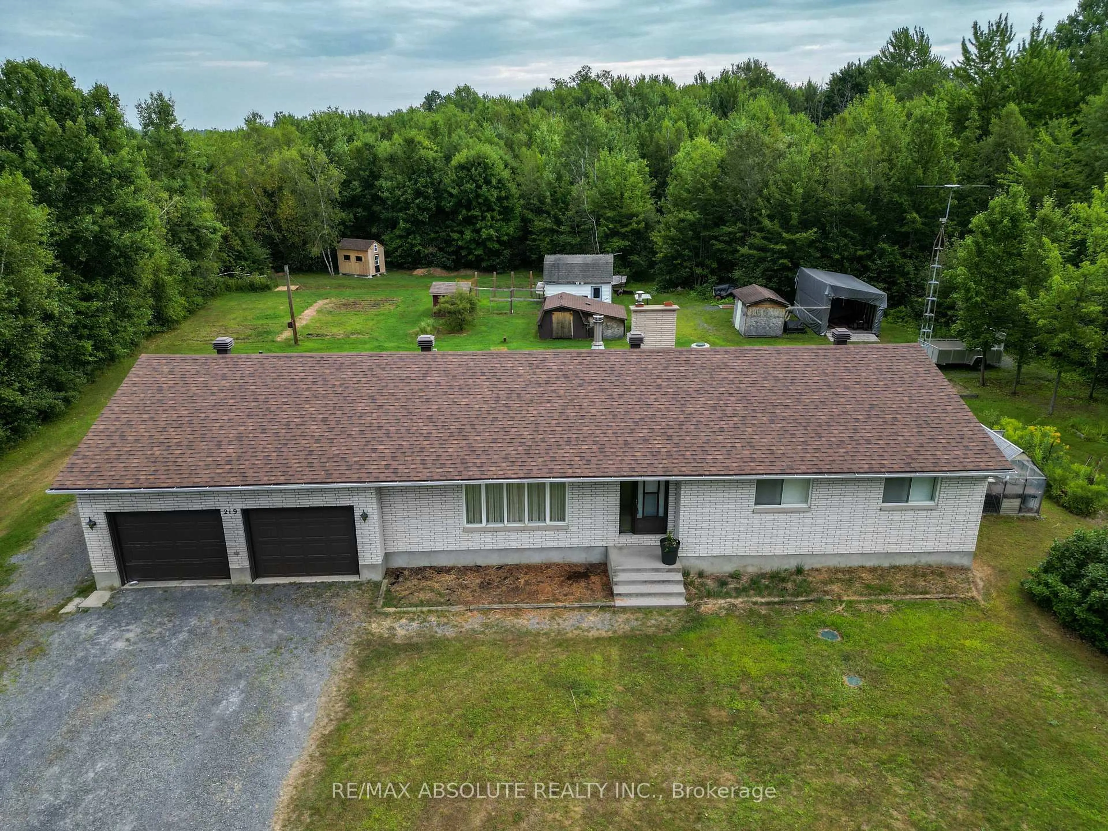 A pic from outside/outdoor area/front of a property/back of a property/a pic from drone, unknown for 219 St Thomas Rd, Russell Ontario K0A 3H0