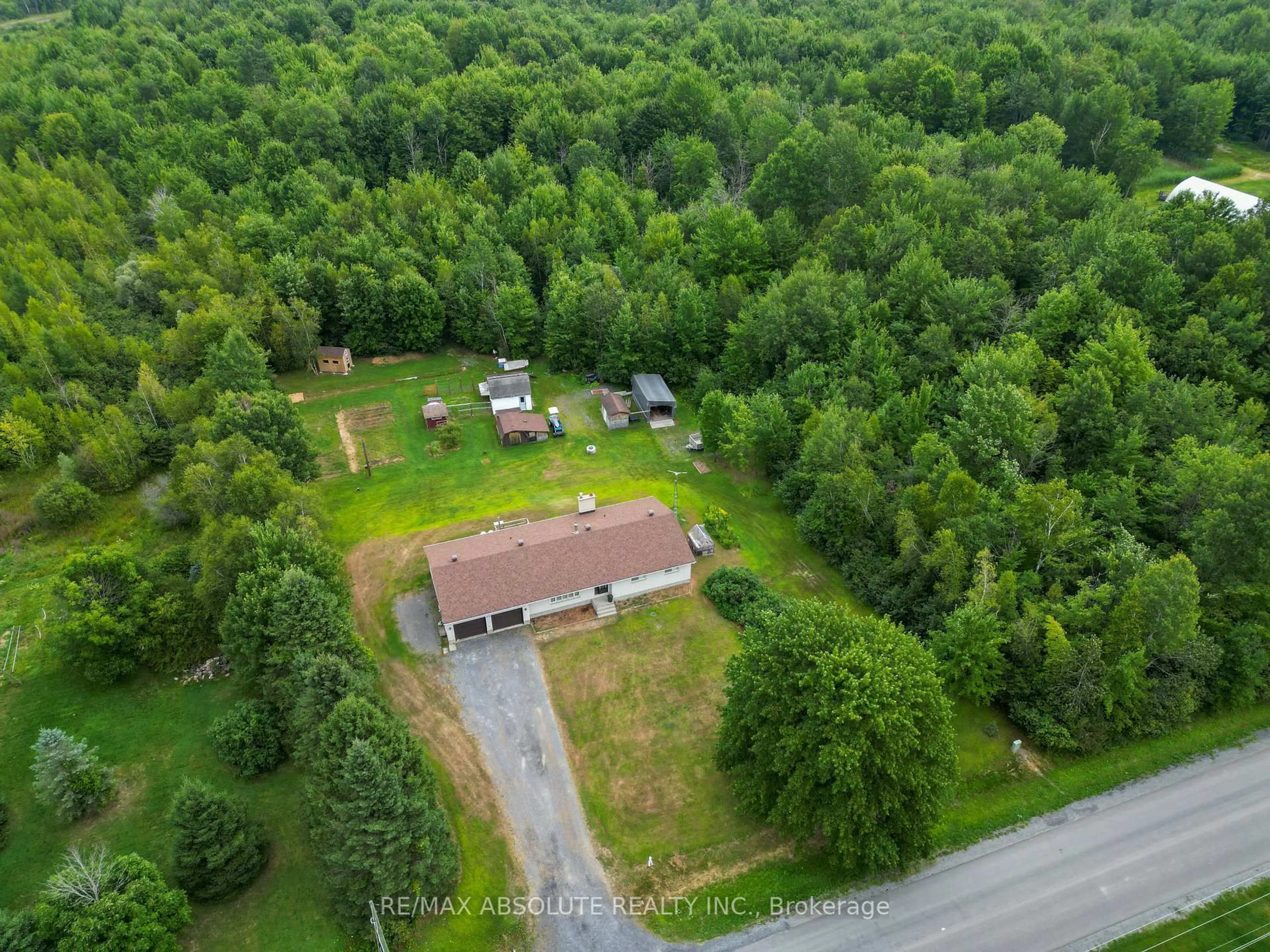 A pic from outside/outdoor area/front of a property/back of a property/a pic from drone, forest/trees view for 219 St Thomas Rd, Russell Ontario K0A 3H0