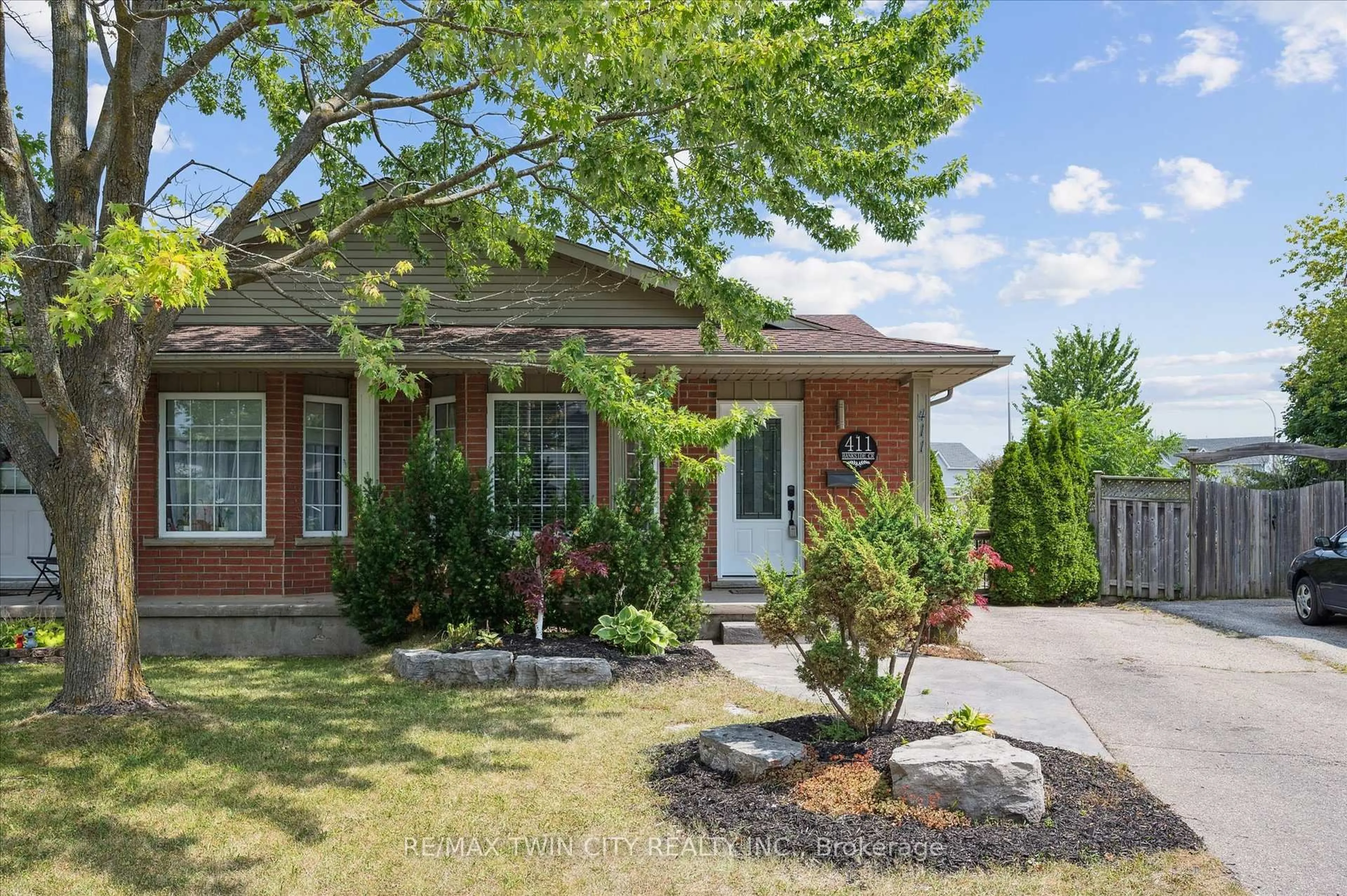 Home with brick exterior material, street for 411 Bankside Cres, Kitchener Ontario N2N 3E5