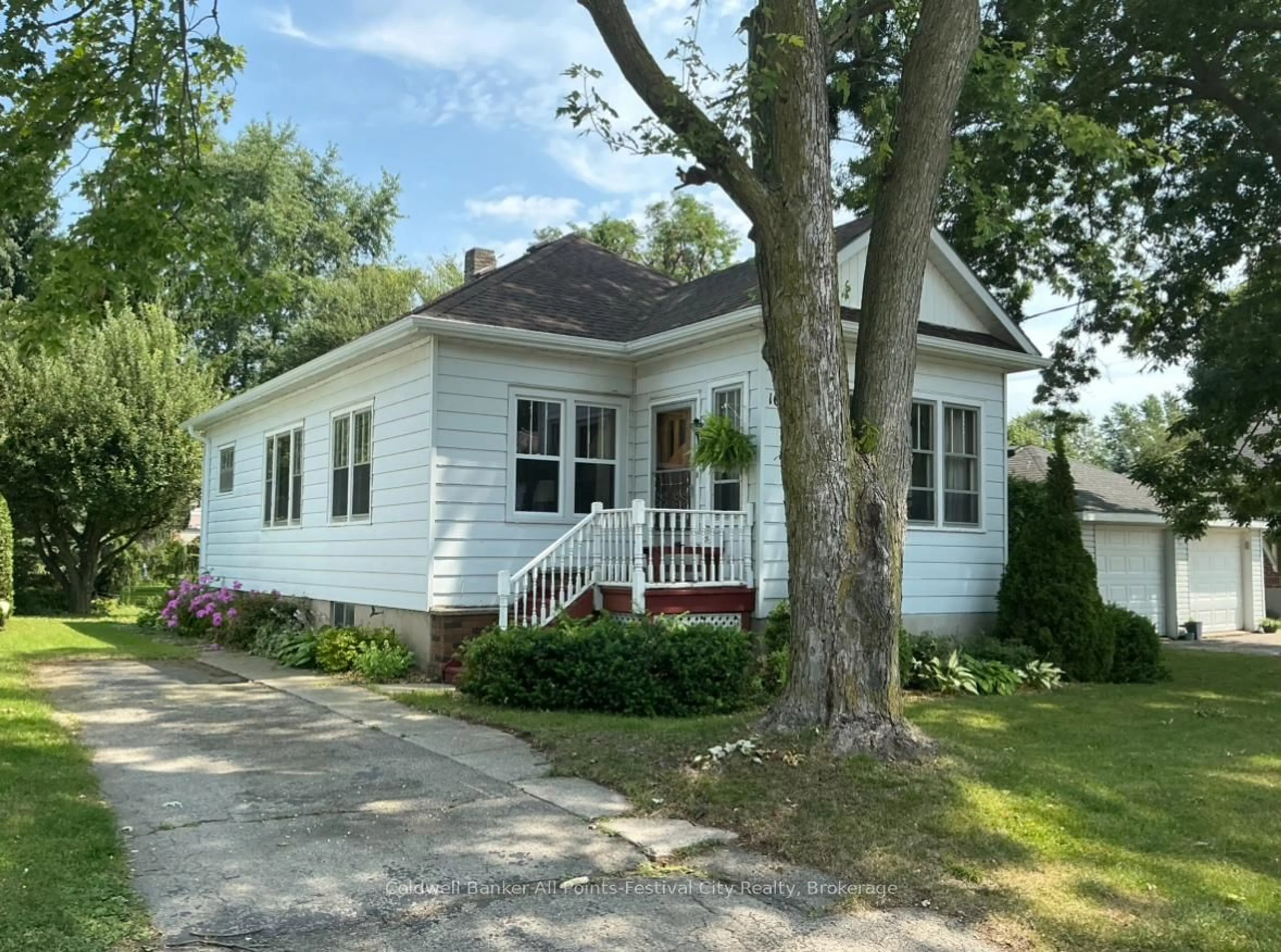 Home with vinyl exterior material, street for 163 Trafalgar St, West Perth Ontario N0K 1N0