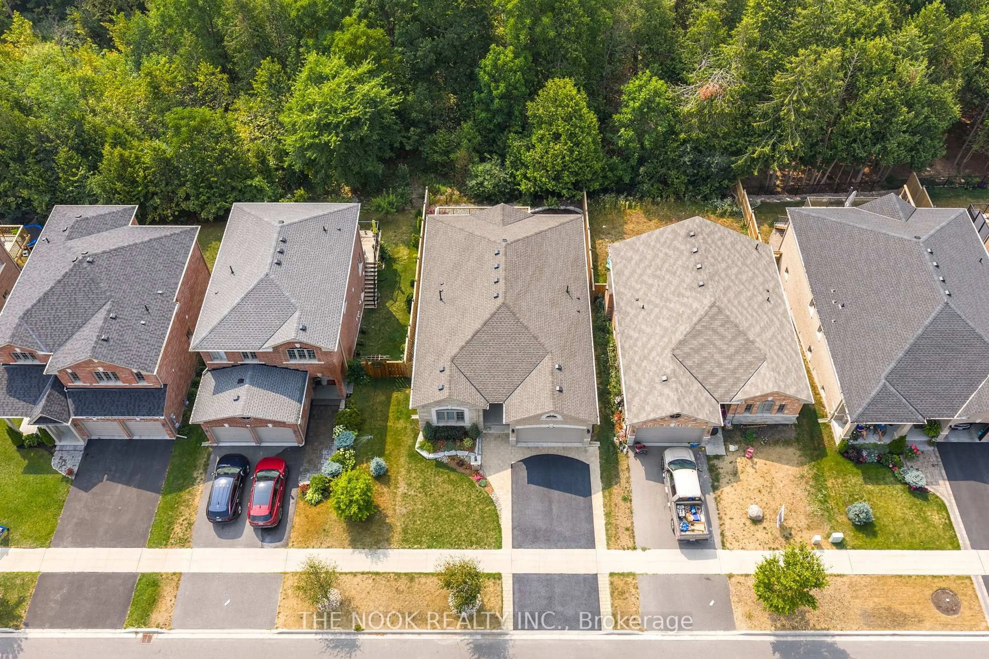 A pic from outside/outdoor area/front of a property/back of a property/a pic from drone, street for 145 Springdale Dr, Kawartha Lakes Ontario K9V 0N1