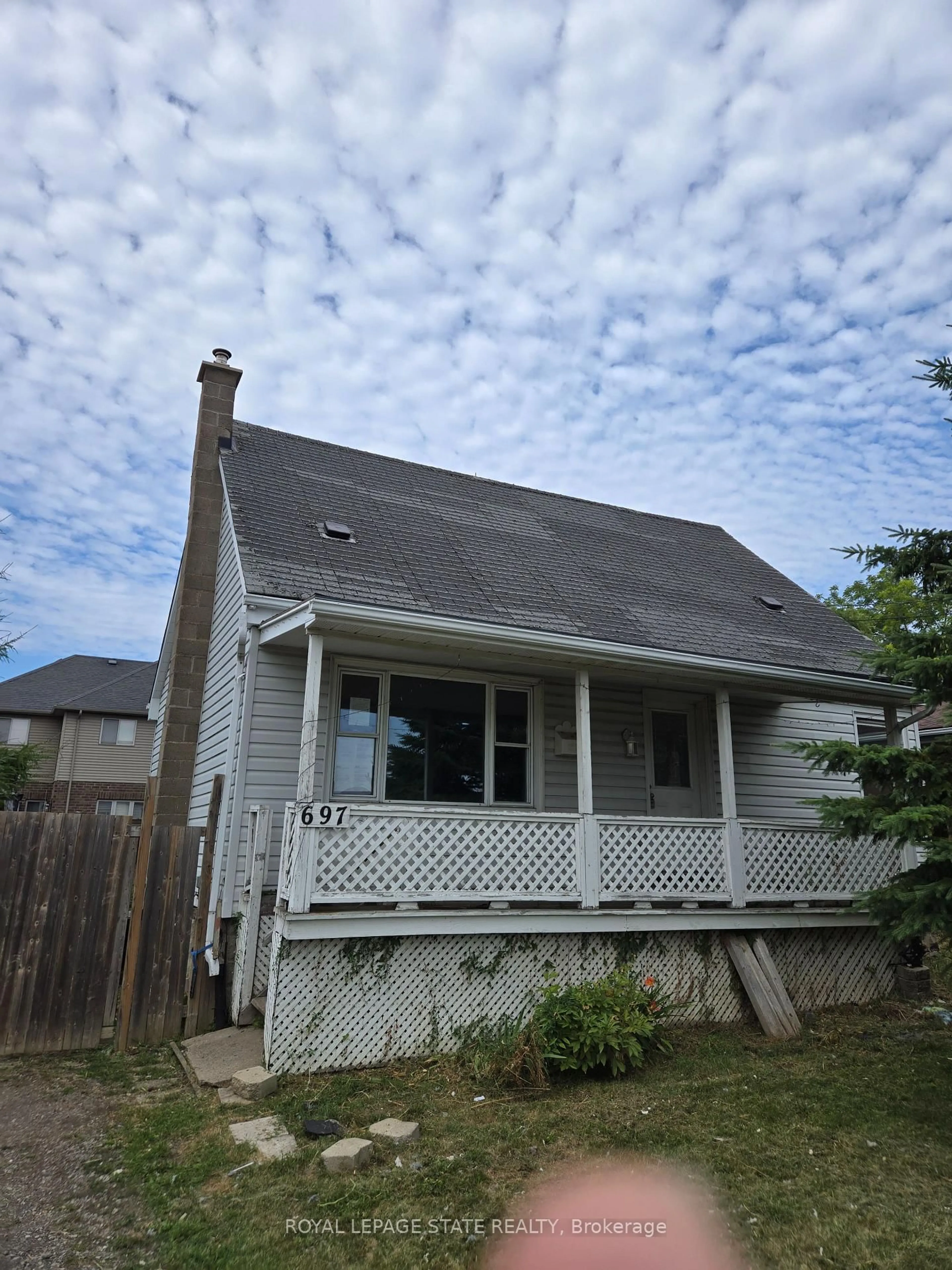 Home with vinyl exterior material, street for 697 Limeridge Rd, Hamilton Ontario L8W 1A4